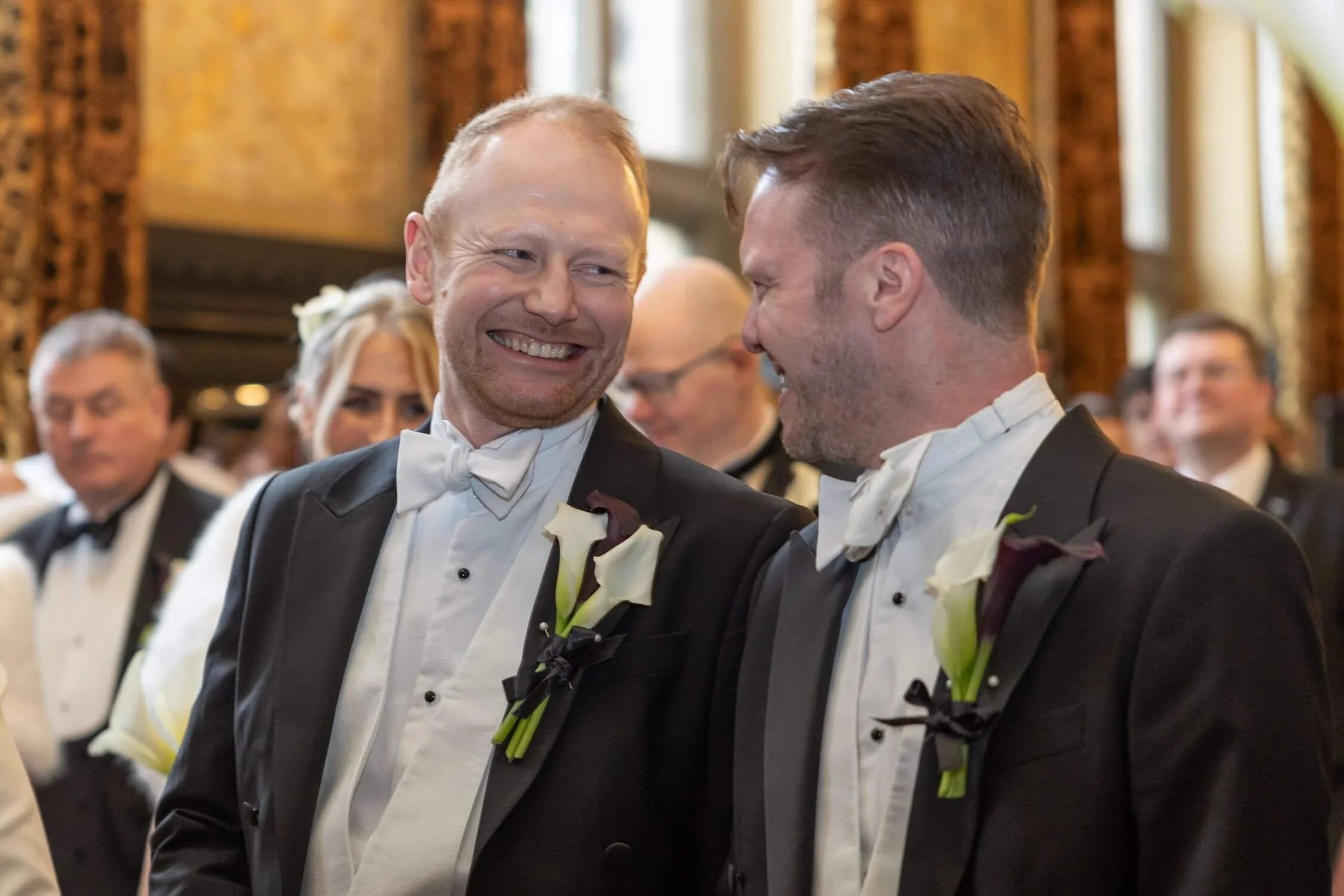 Two grooms stand together smiling in their celebrant ceremony with Michelle Park Celebrant at Carlton Towers, Goole