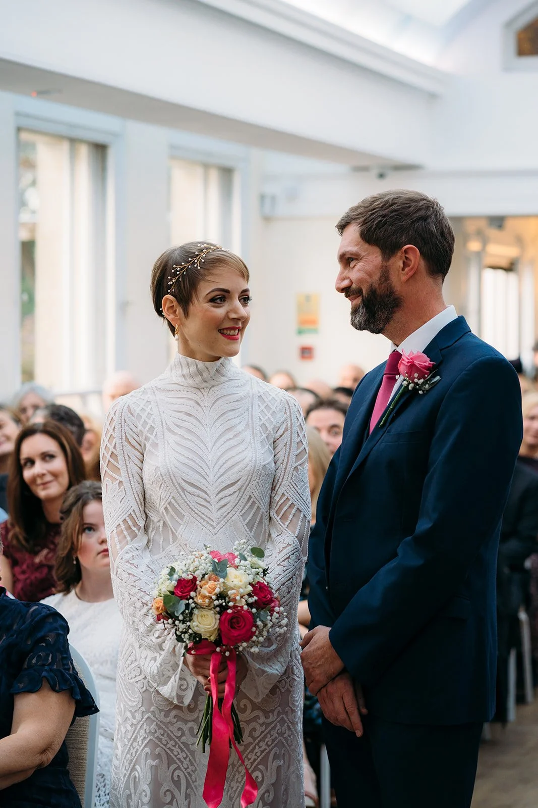 A bride and groom stand together at their celebrant wedding with Michelle Park Celebrant