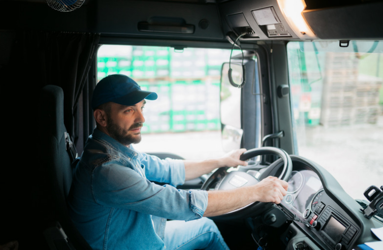 H2A program worker driving a truck
