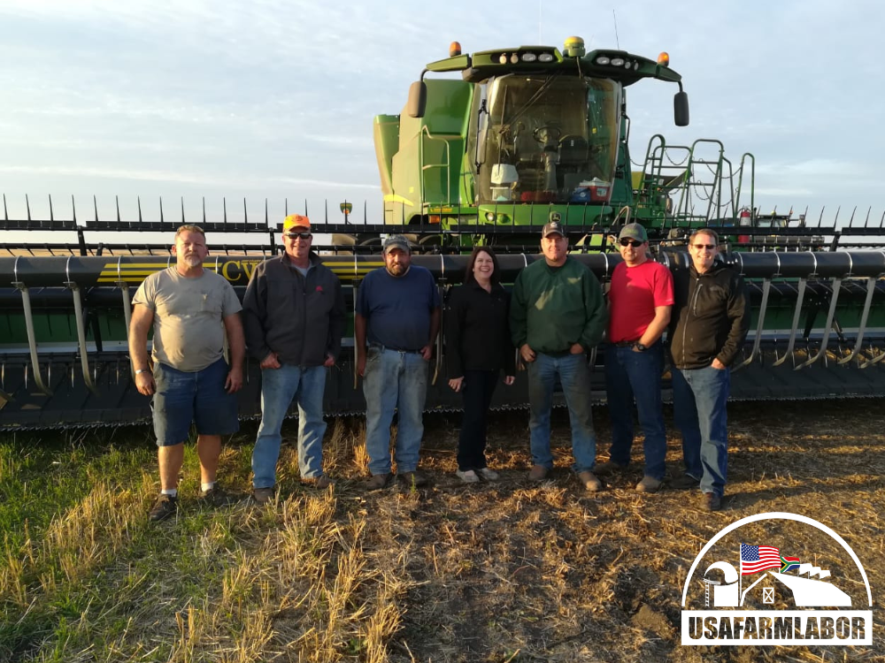 image of H2A workers with farmer for H2A worker retention