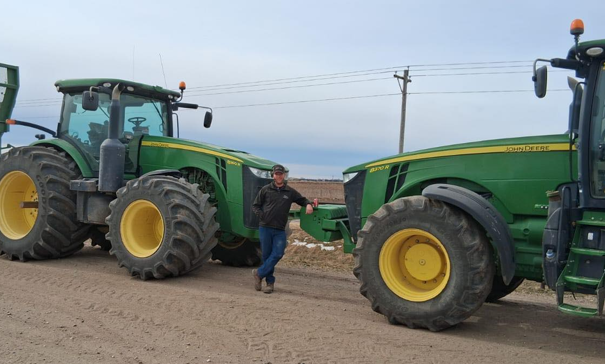 Happy H2A program worker returning to farm