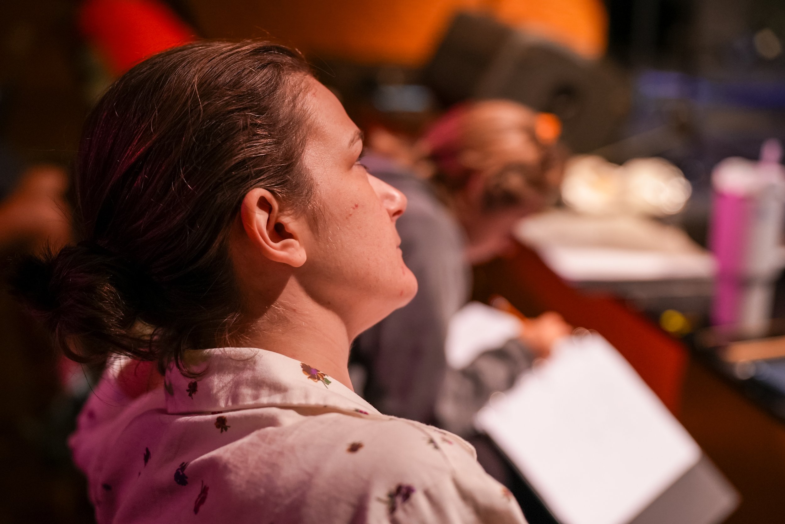 Cast member watching rehearsals