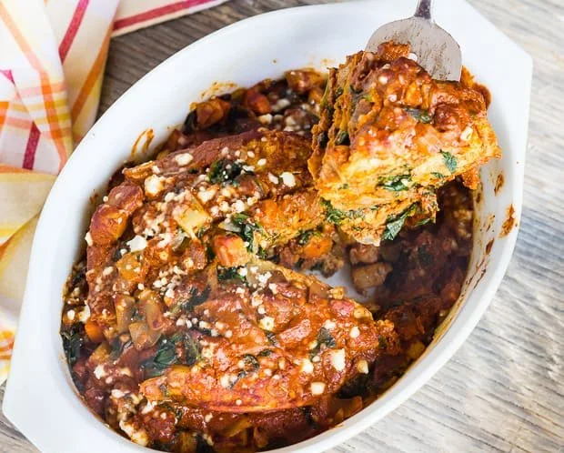 Carrot, potato, and spinach enchilada casserole