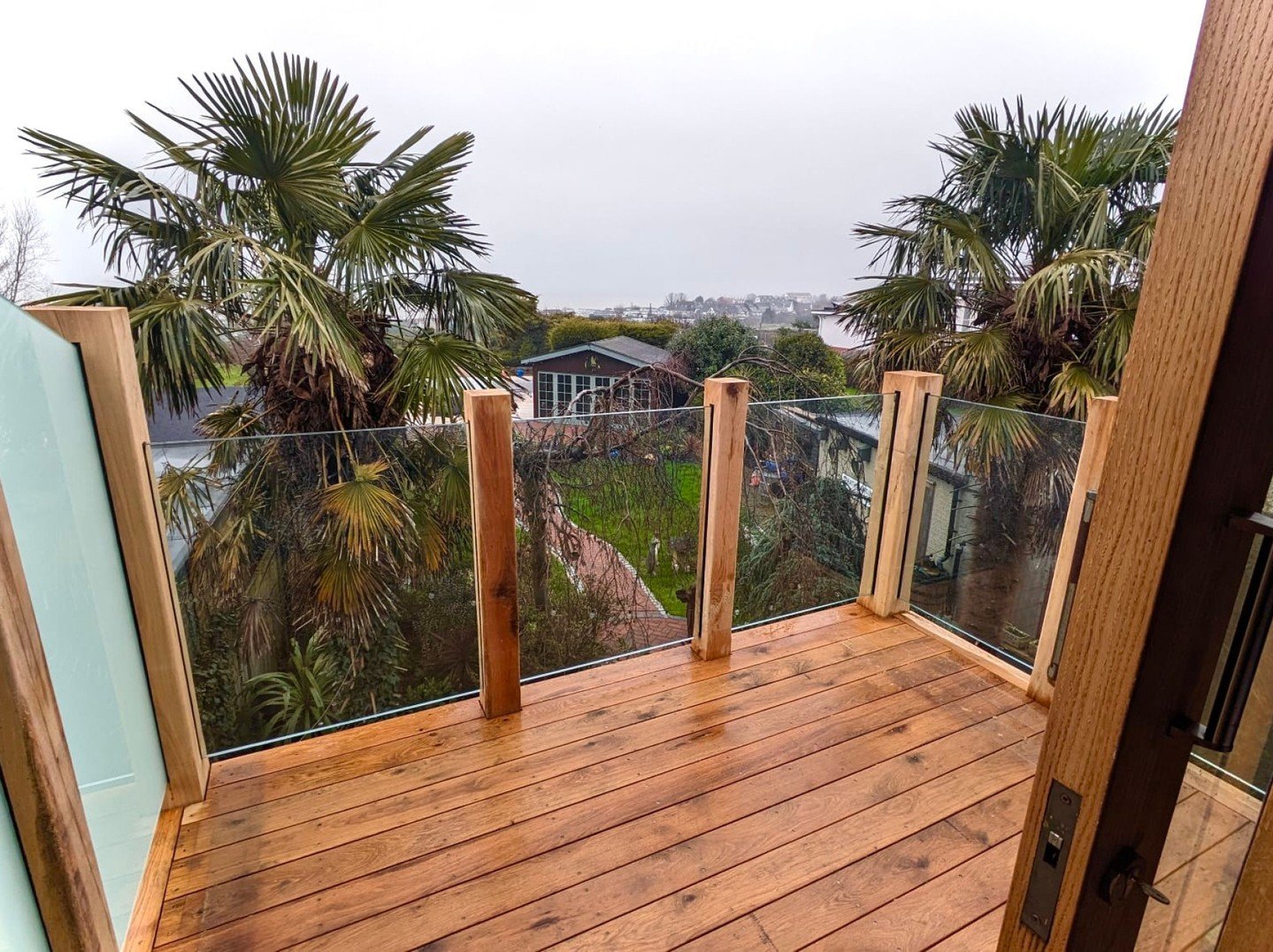 This customer used to have a balcony that truly felt unsafe to be on. We crafted them this balcony so they could enjoy the view from on top but also with a hidden gutter system to keep the downstairs dry. So come rain or shine they have an outdoor ar