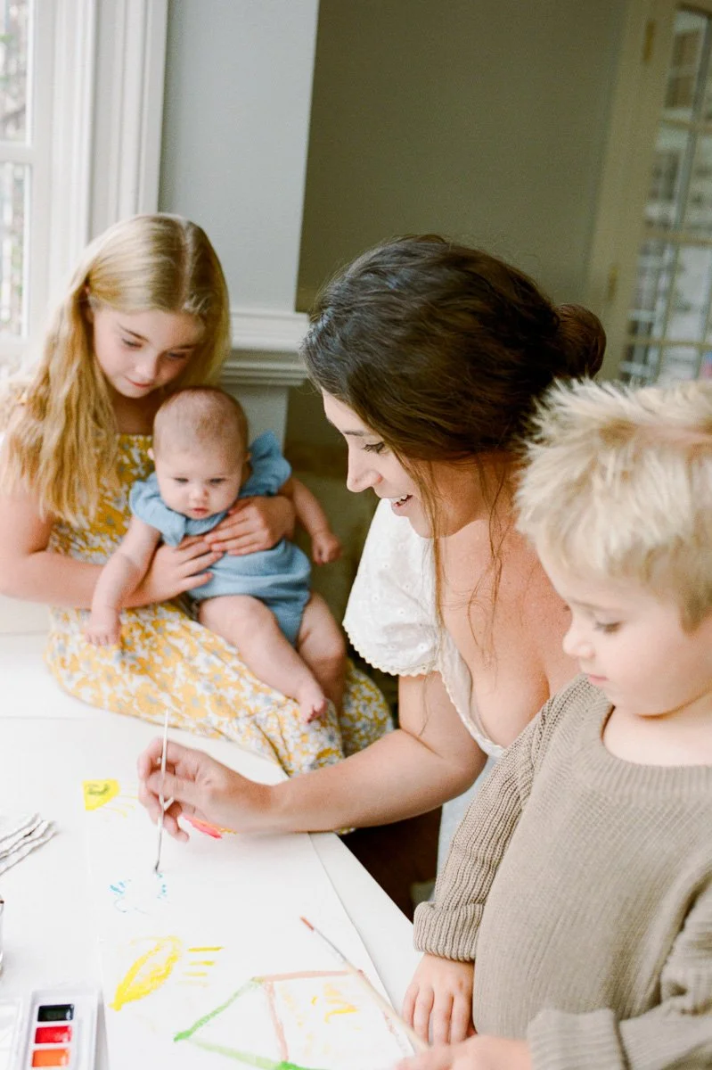 watercolor-painting-in-home-family-session-35mm-film-nc