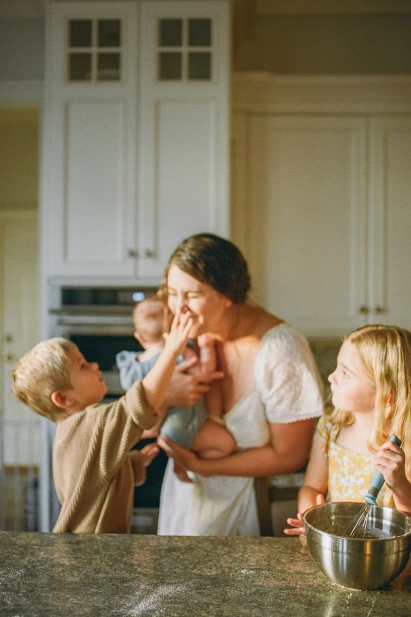 documentary-family-photography-baking-in-kitchen-during-golden-hour-nc