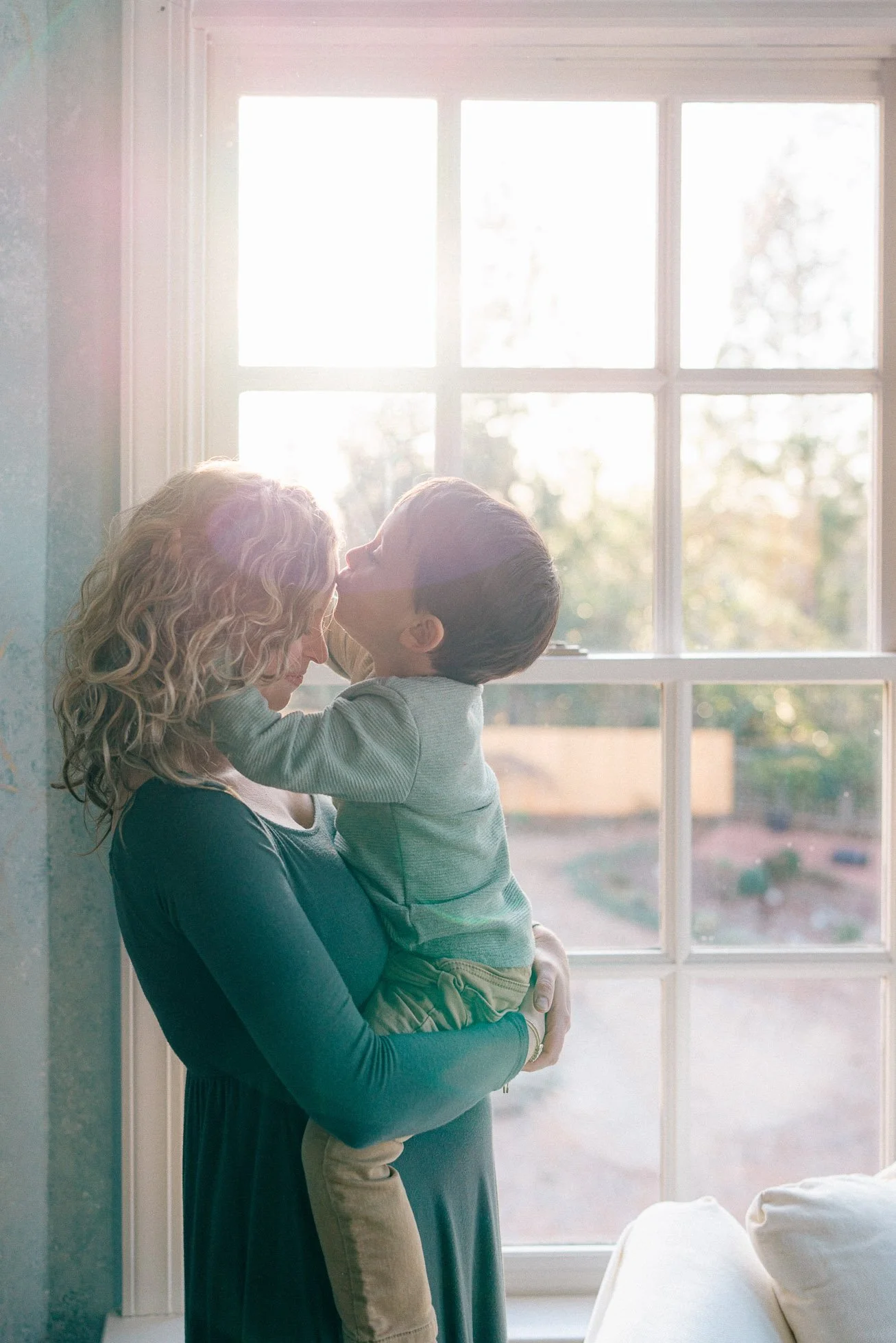 maternity-session-boy-kissing-mom-greensboro-nc.jpg