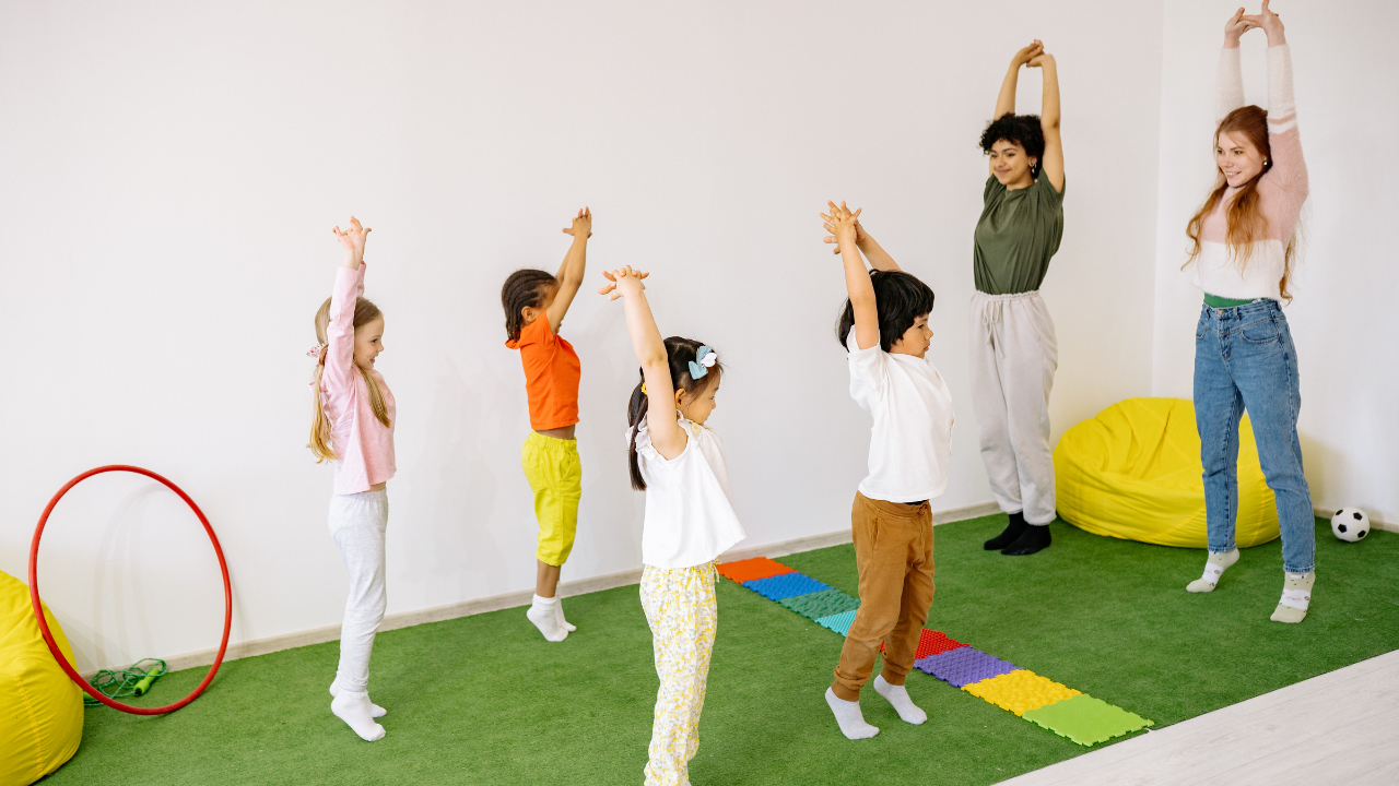 Children participating in a creative yoga and mindfulness camp during a non-school day enrichment program in the Twin Cities area.