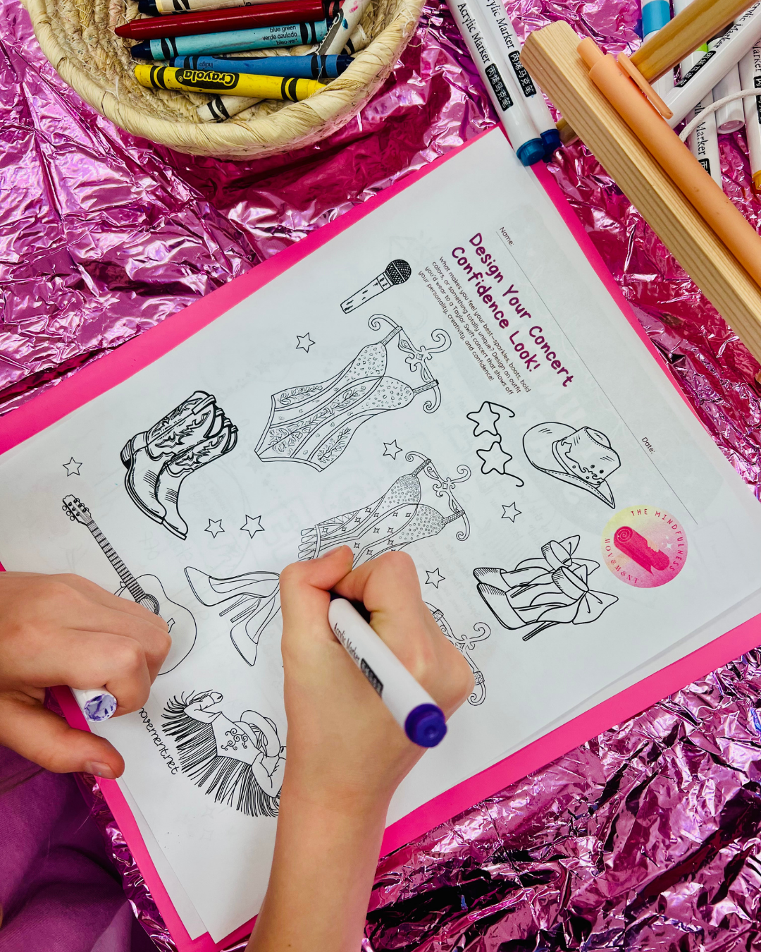 Kids doing a playful stretching and movement activity during a Mounds View summer camp for kids.