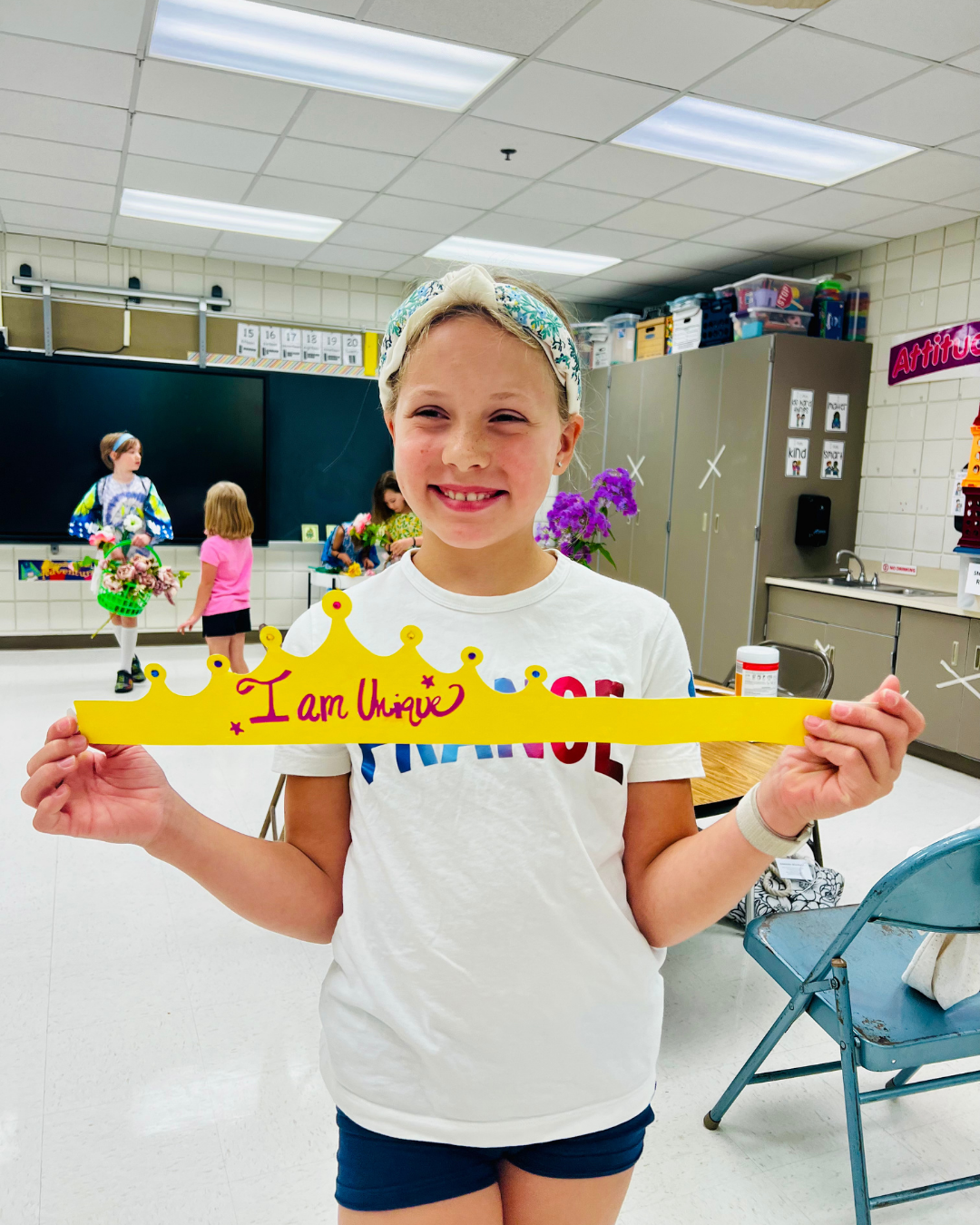 Campers creating colorful crafts during a kids summer camp in the Mounds View area.