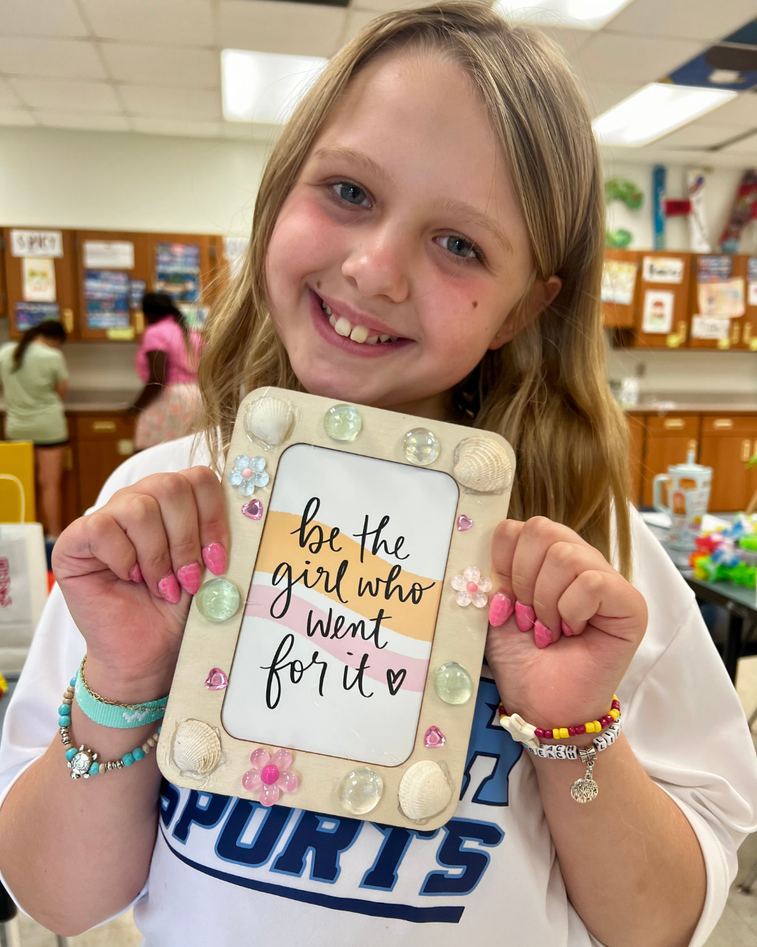 Kids creating a hands-on craft project during a mindfulness-based summer camp in the Mounds View area.