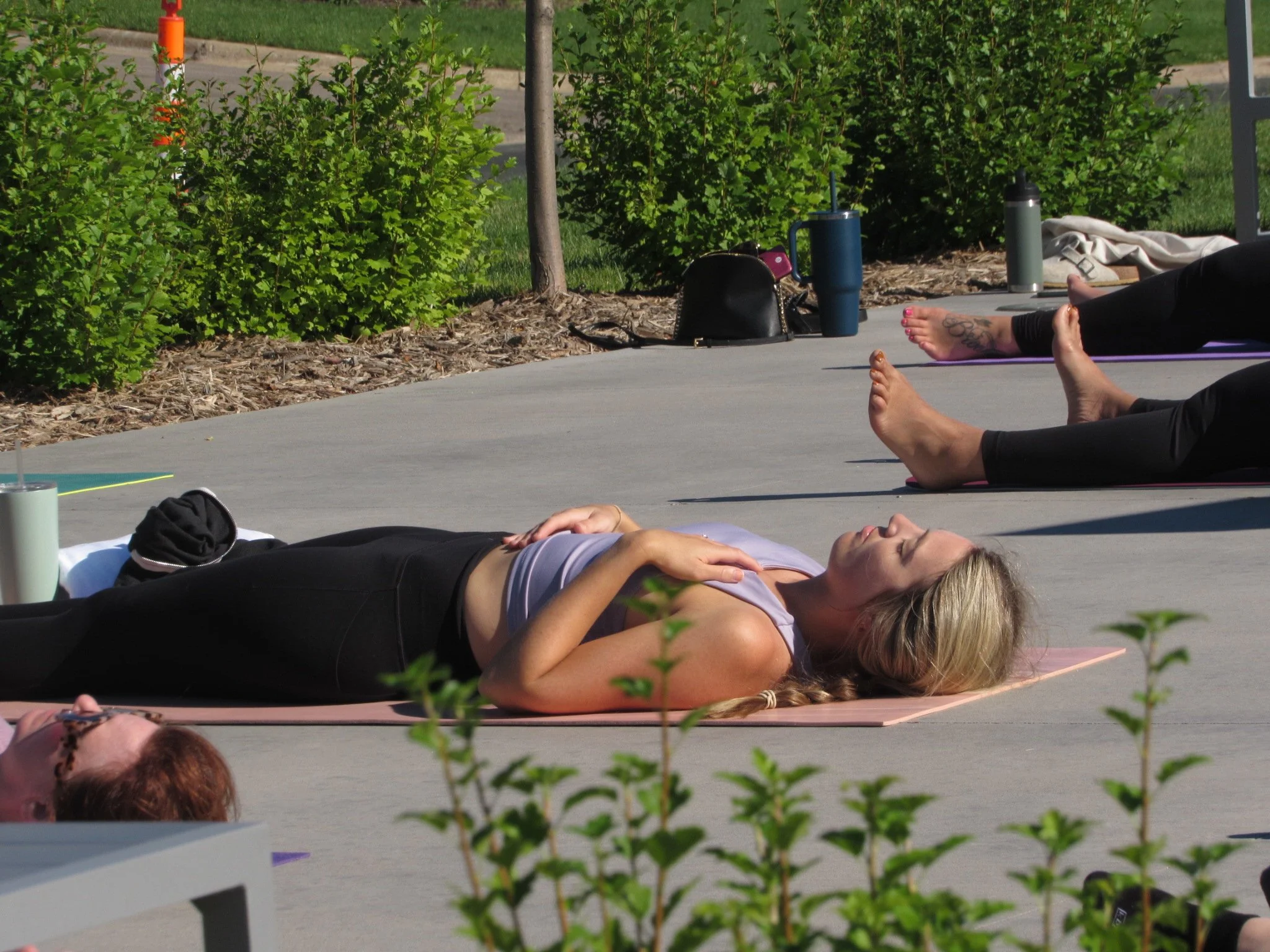 Adult mindful movement and yoga class focused on stress relief and relaxation at The Mindfulness Movement in New Brighton, Minnesota.
