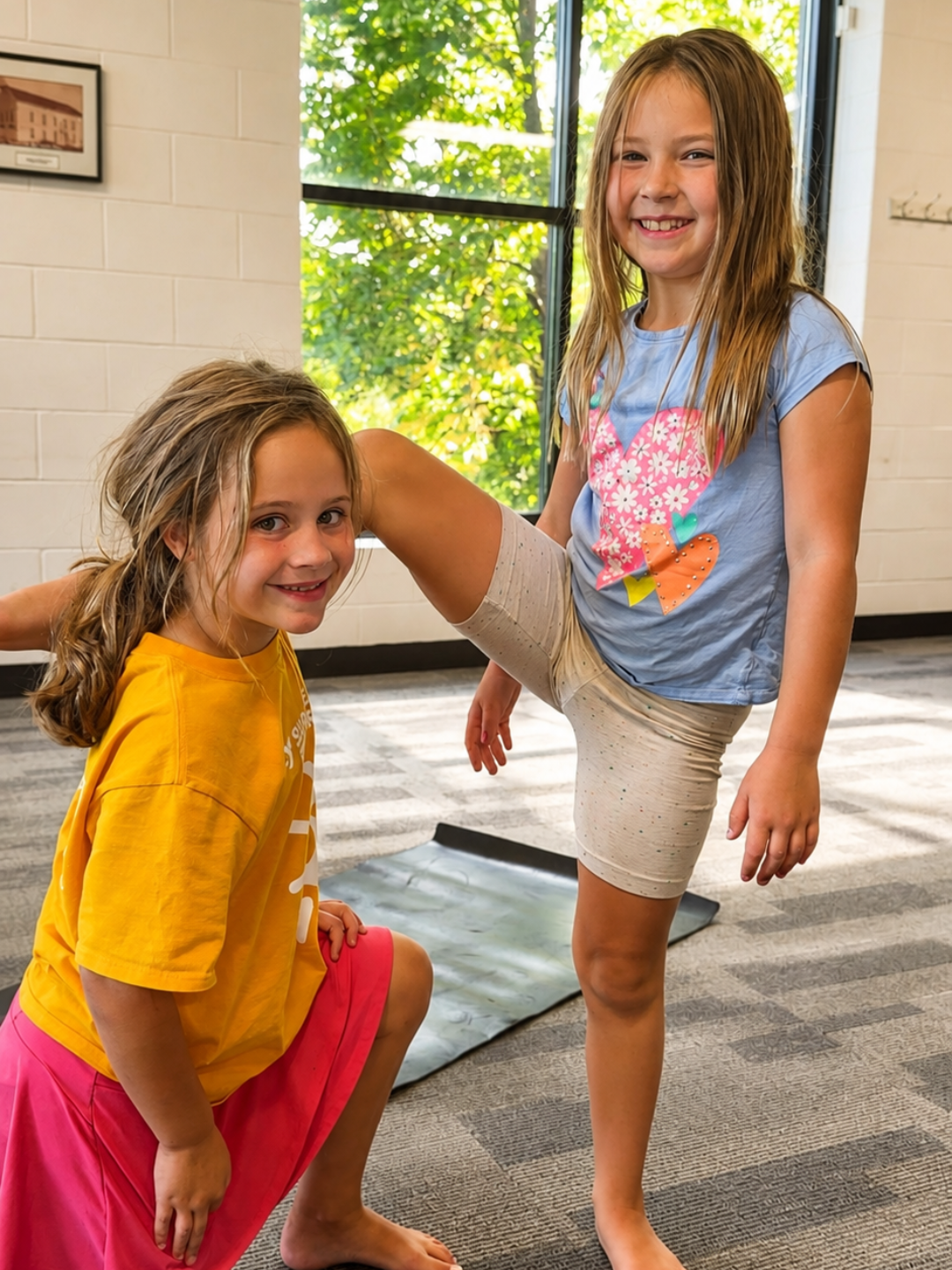 Tumbler decorated with multiple Mindful Movement Kids collectible badges