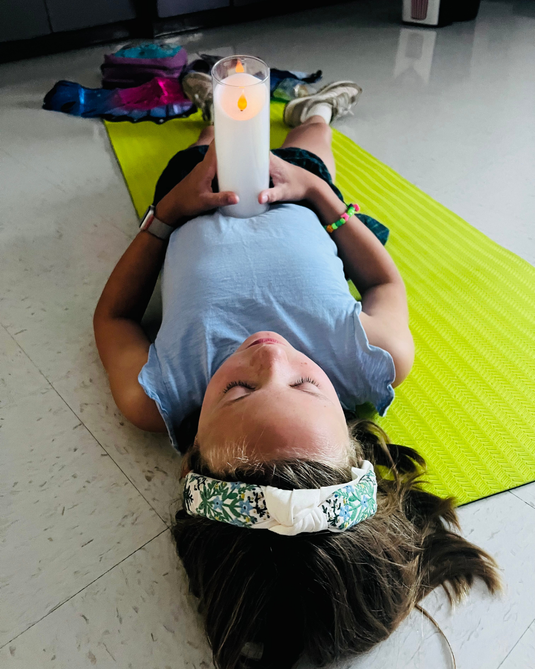 Kids practicing mindful listening and focus during a Mounds View summer camp activity.