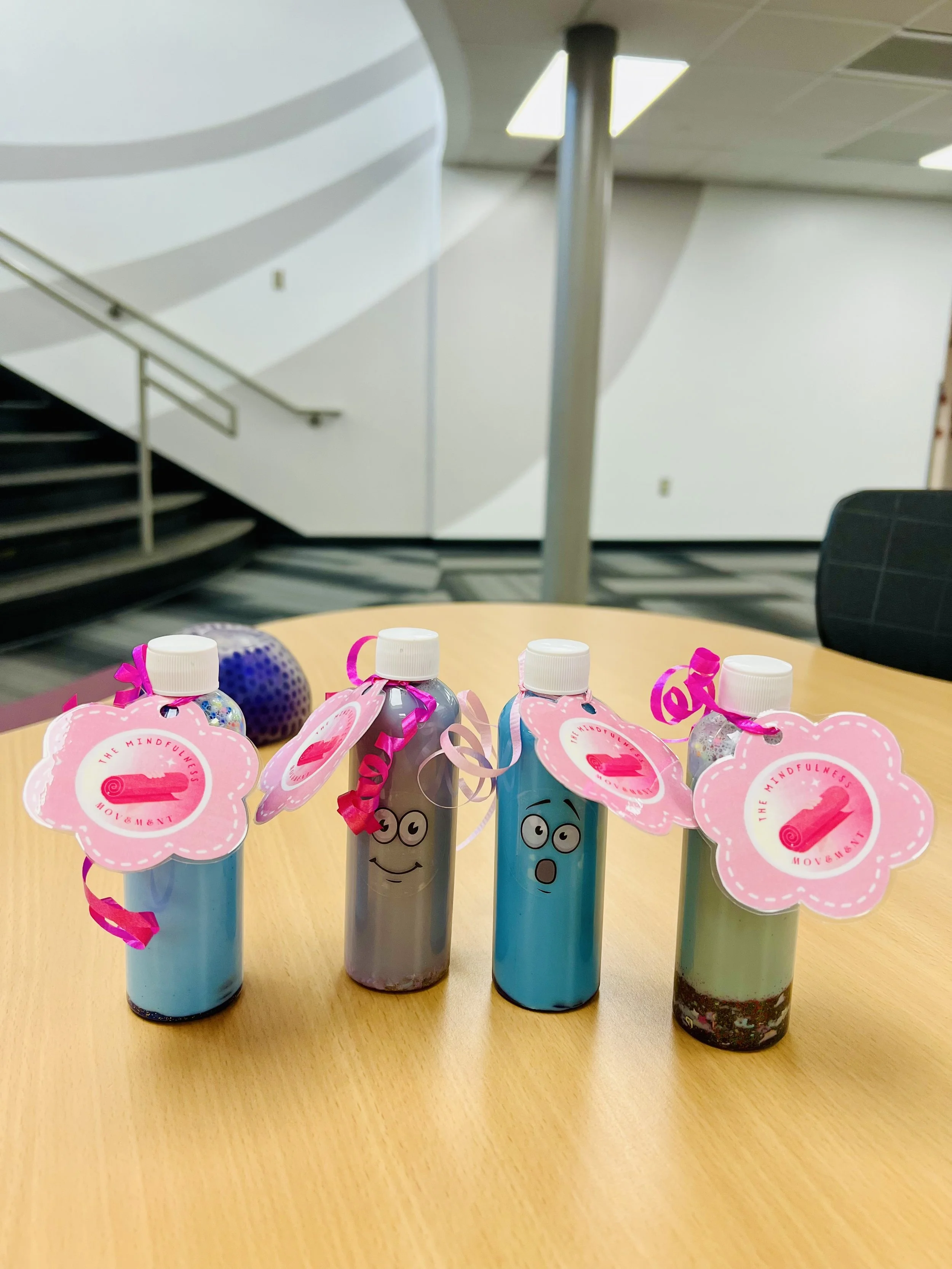 Color-coded emotion sensory bottles made by students in White Bear Lake Community Education after school mindfulness enrichment class