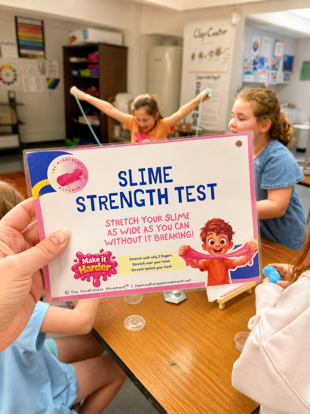 Kids practicing yoga with Squishmallows during a Squishmallow Yoga mindfulness camp on a non-school day