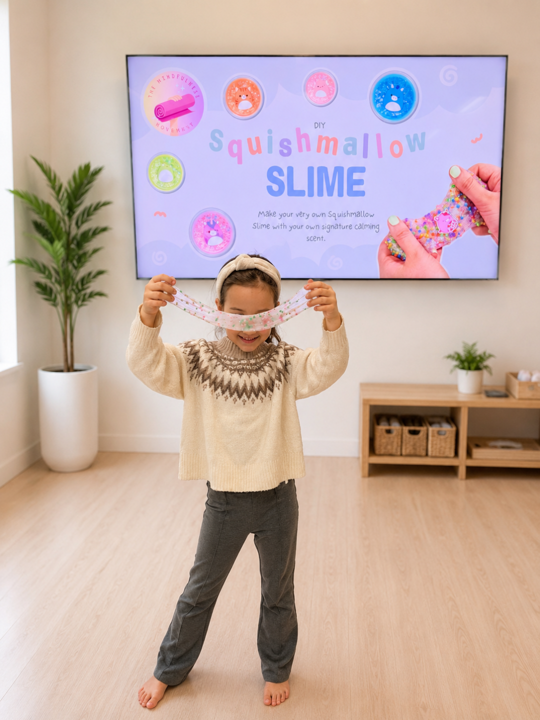 Child in a calm moment with their Squishmallow during a mindfulness yoga retreat for kids at New Brighton Community Center