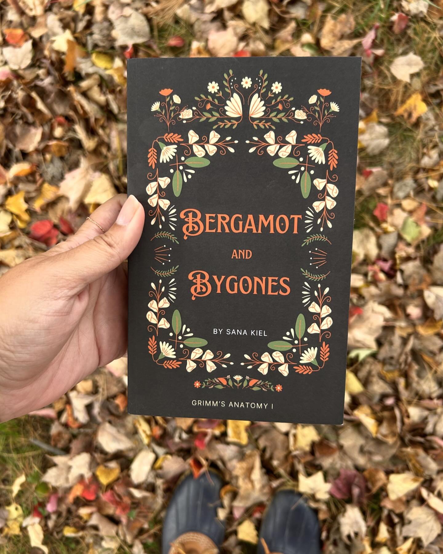Saw a cool lake, pulled over, and had to take advantage of fall leaves. Have you read Bergamot &amp; Bygones yet?? It&rsquo;s a paranormal romance set in coastal Maine with childhood best friends (who obviously turn into lovers) navigating a bout wit