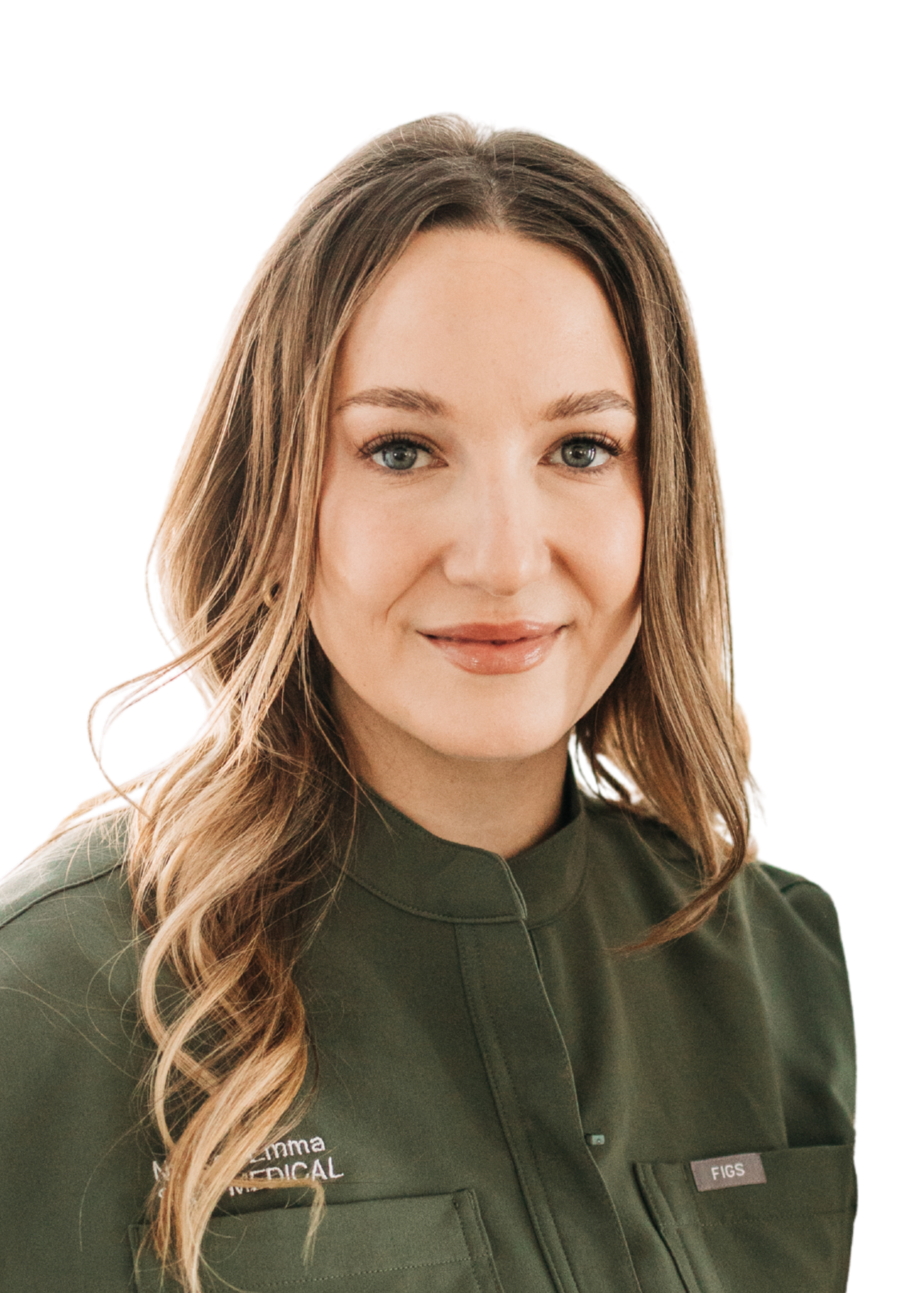 Portrait of a young woman with wavy brown hair, blue eyes, wearing a black blazer and earrings, smiling against a plain white background.