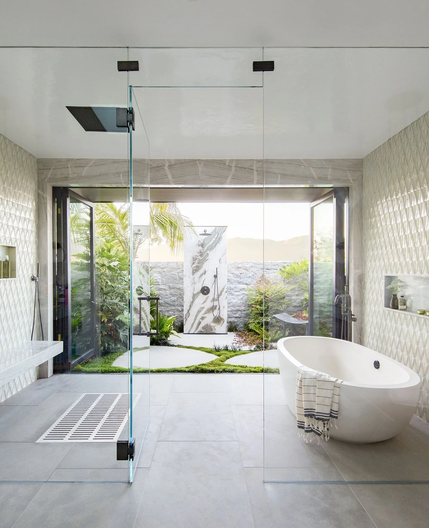 ⁠When you finally pull me out of that live edge bed with a view...there may be the same challenge dragging me out of the primary bathroom, designed for peaceful relaxation and spa like pampering.⁠
⁠
The glass enclosed shower and tub room, with a larg