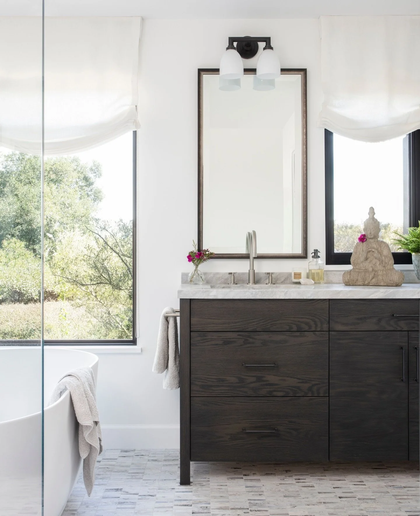 ⁠Last but not least, and one of the more dramatic transformations at our Camp Coyote project, was the primary bath. ⁠
⁠
This space had odd details and built-ins, including an undercounter refrigerator and microwave installed in a little side upper an