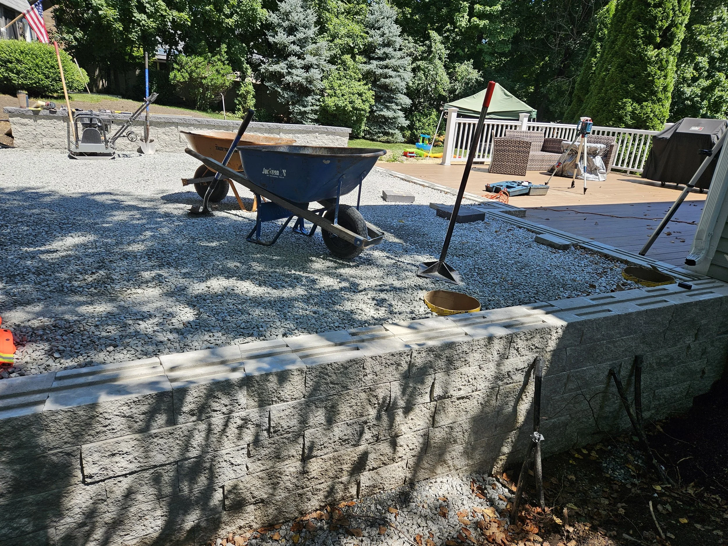 Lots of tamping to ensure a solid base for the patio