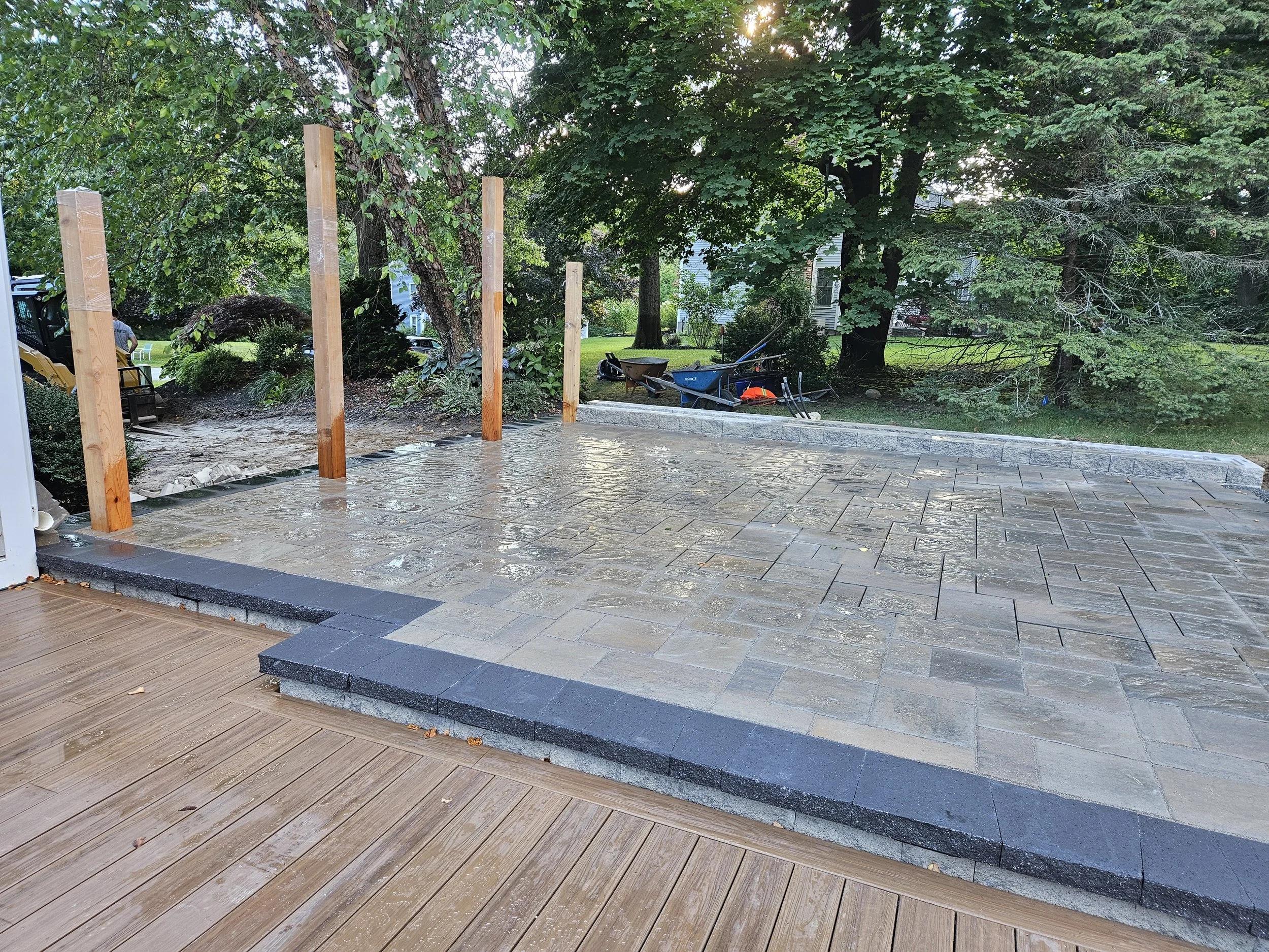Deck steps up to new patio