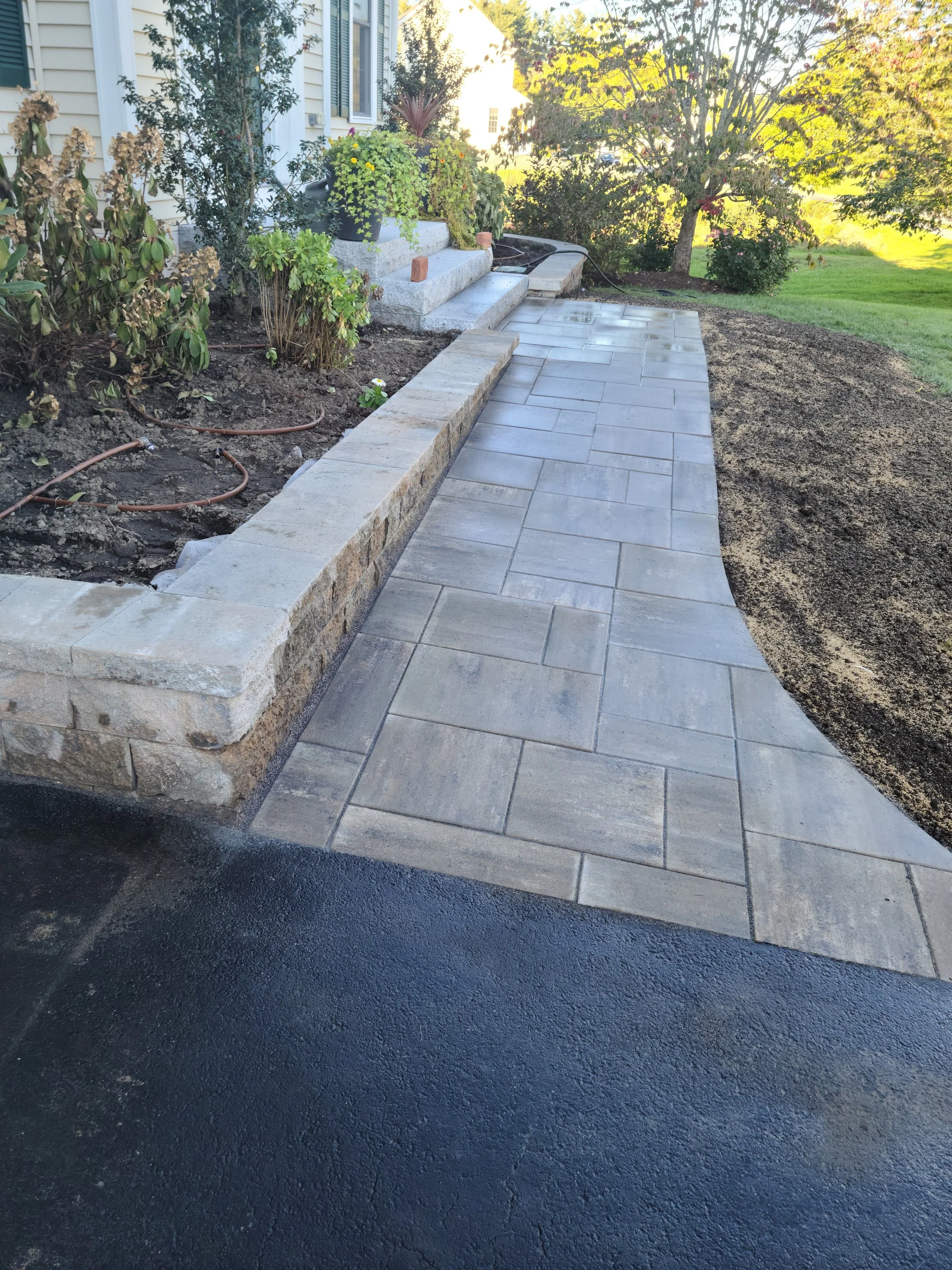 Paver walkway and retaining wall