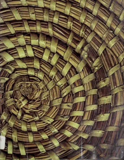 close up of a circle filled with the pattern of a sweetgrass basket