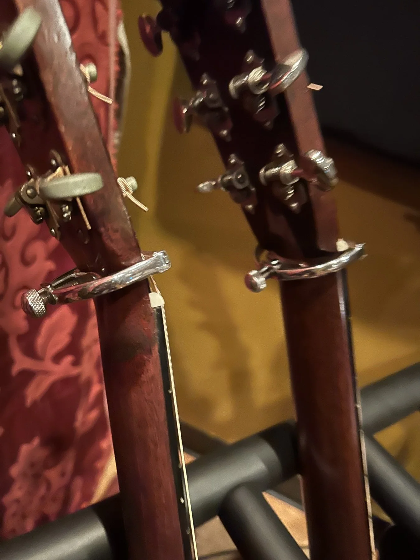 Guitar headstocks in a recording studio.