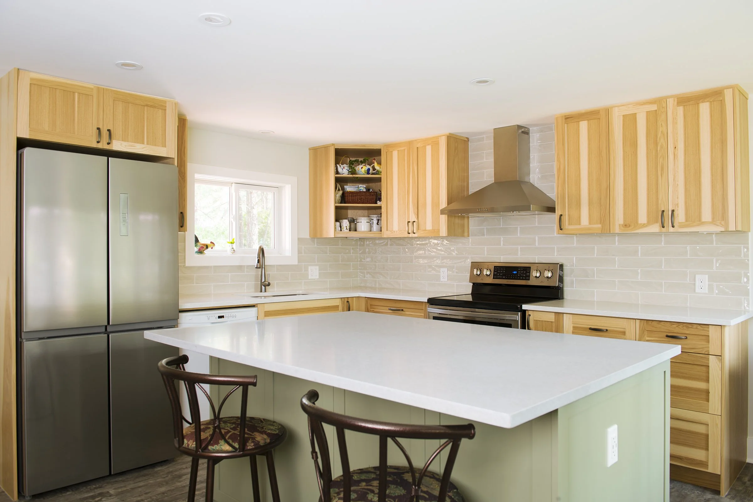 This Wasa, BC kitchen and bathroom renovation created an environment that would be the family hub for decades to come. Oak Craft Construction in Kimberley, BC.