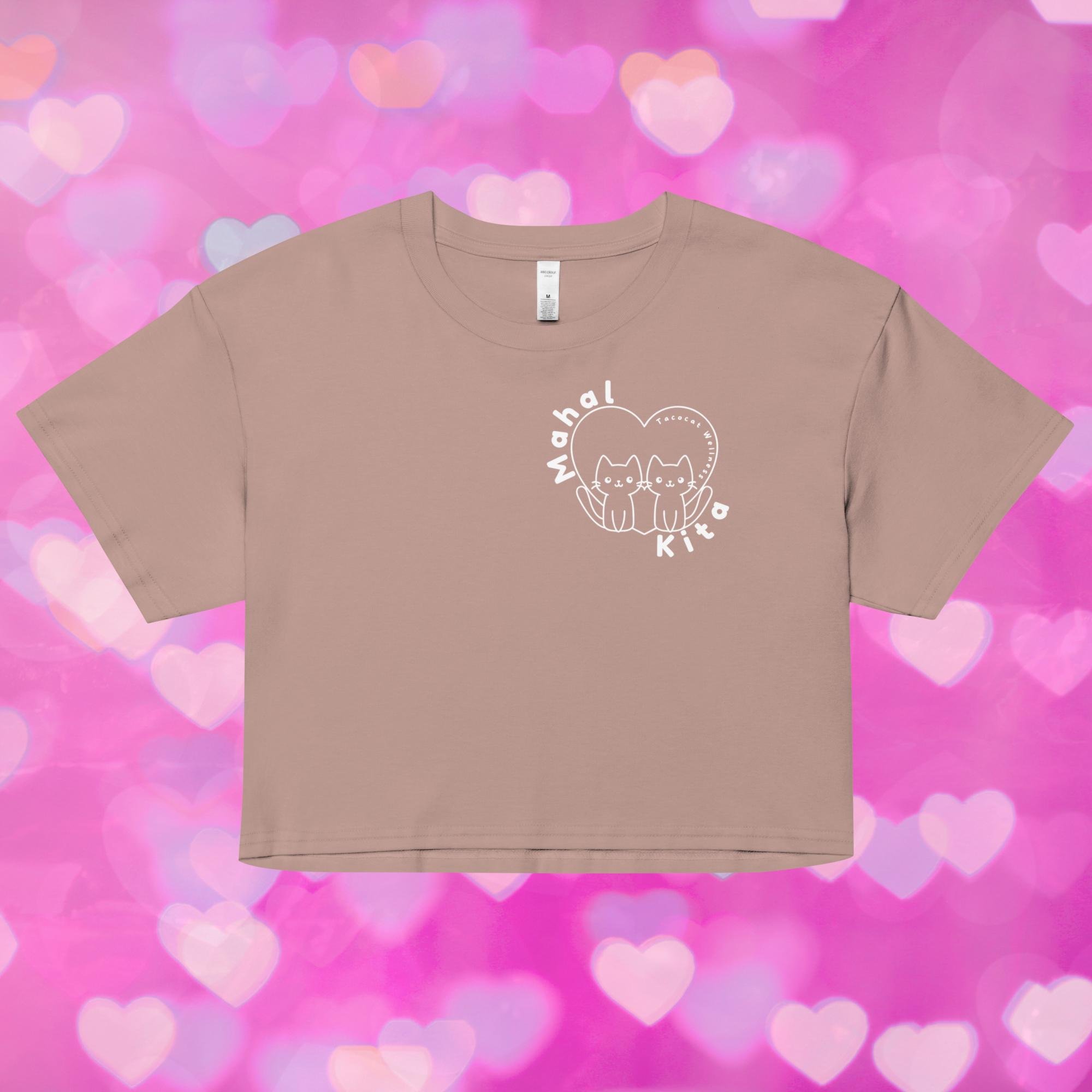 A relaxed-fit crop top featuring a cute illustrated cat and the words “Mahal Kita” in playful Tagalog script. Design is centered on the chest.