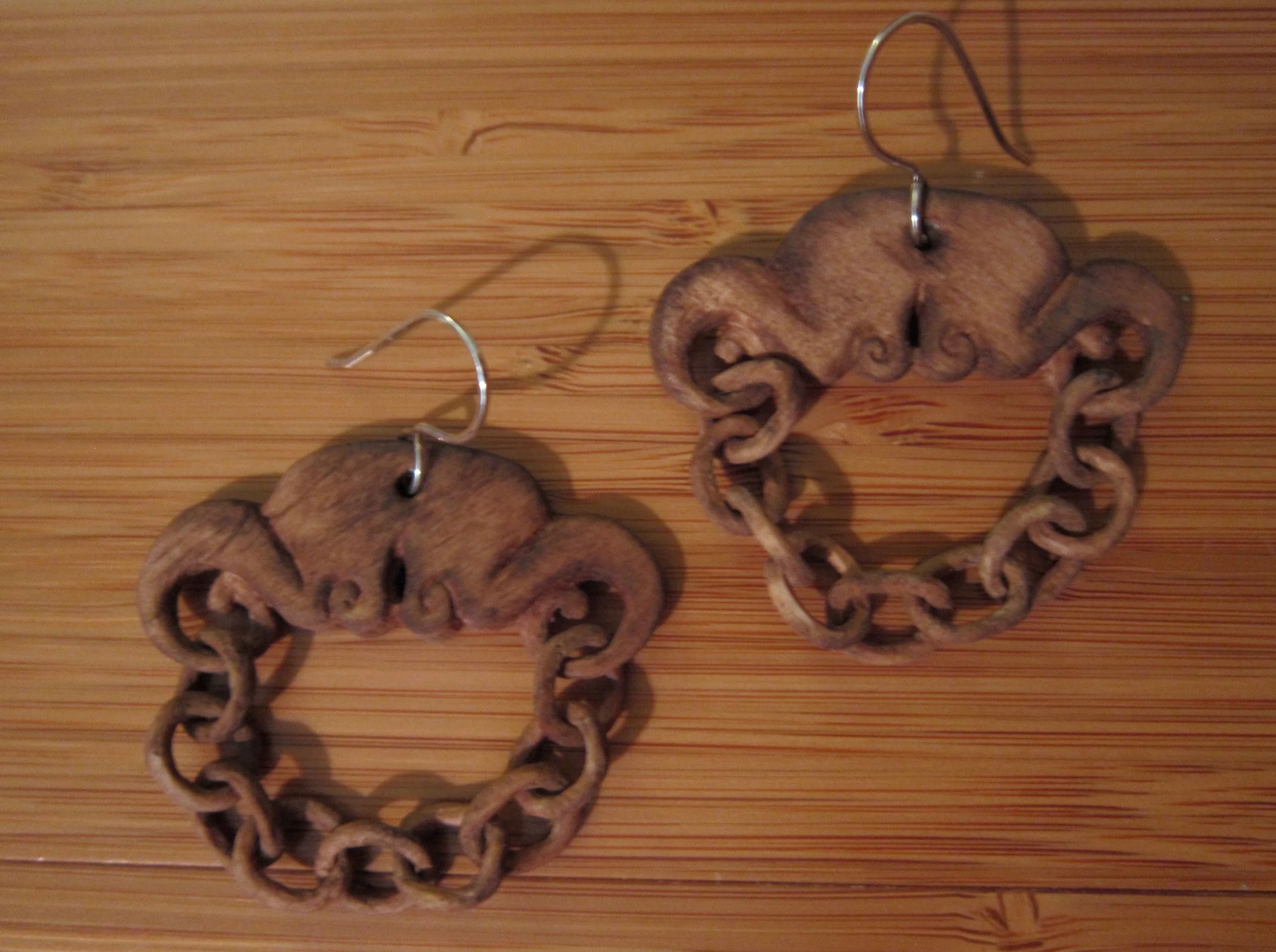 Wood chain earrings with sterling silver french hook ear wires.