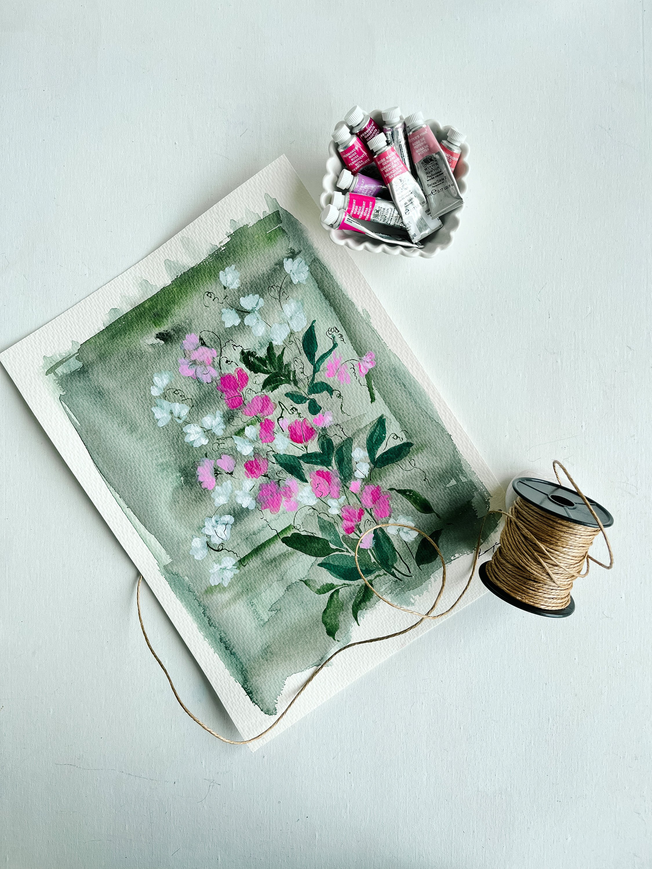 Vintage pink and white sweet pea painting on a sage green background color.