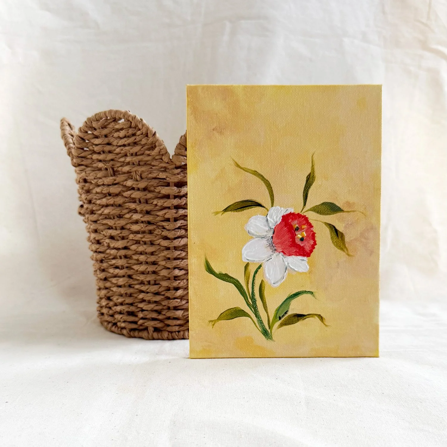 Daffodil original painting with heavy impasto texture and glass beads on a warm yellow background.