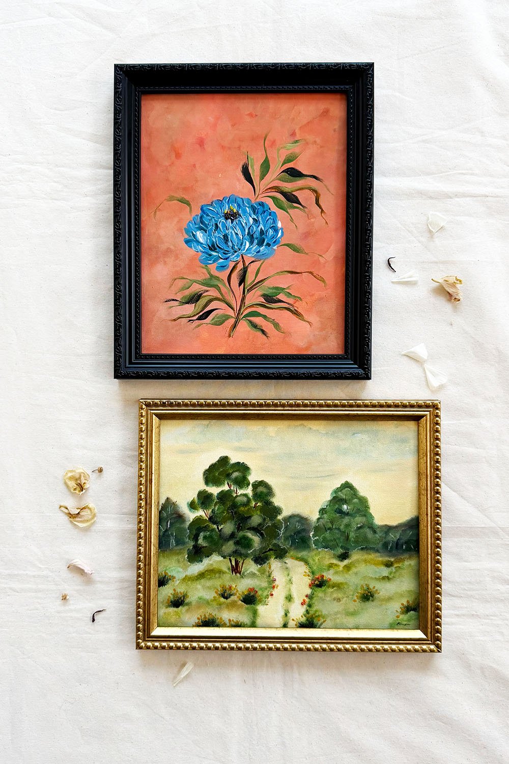 Vibrant blue peony painting on terracotta background representing self-assurance and growth.Mixed media landscape art with orange and red glass beads to create tactile earth texture.