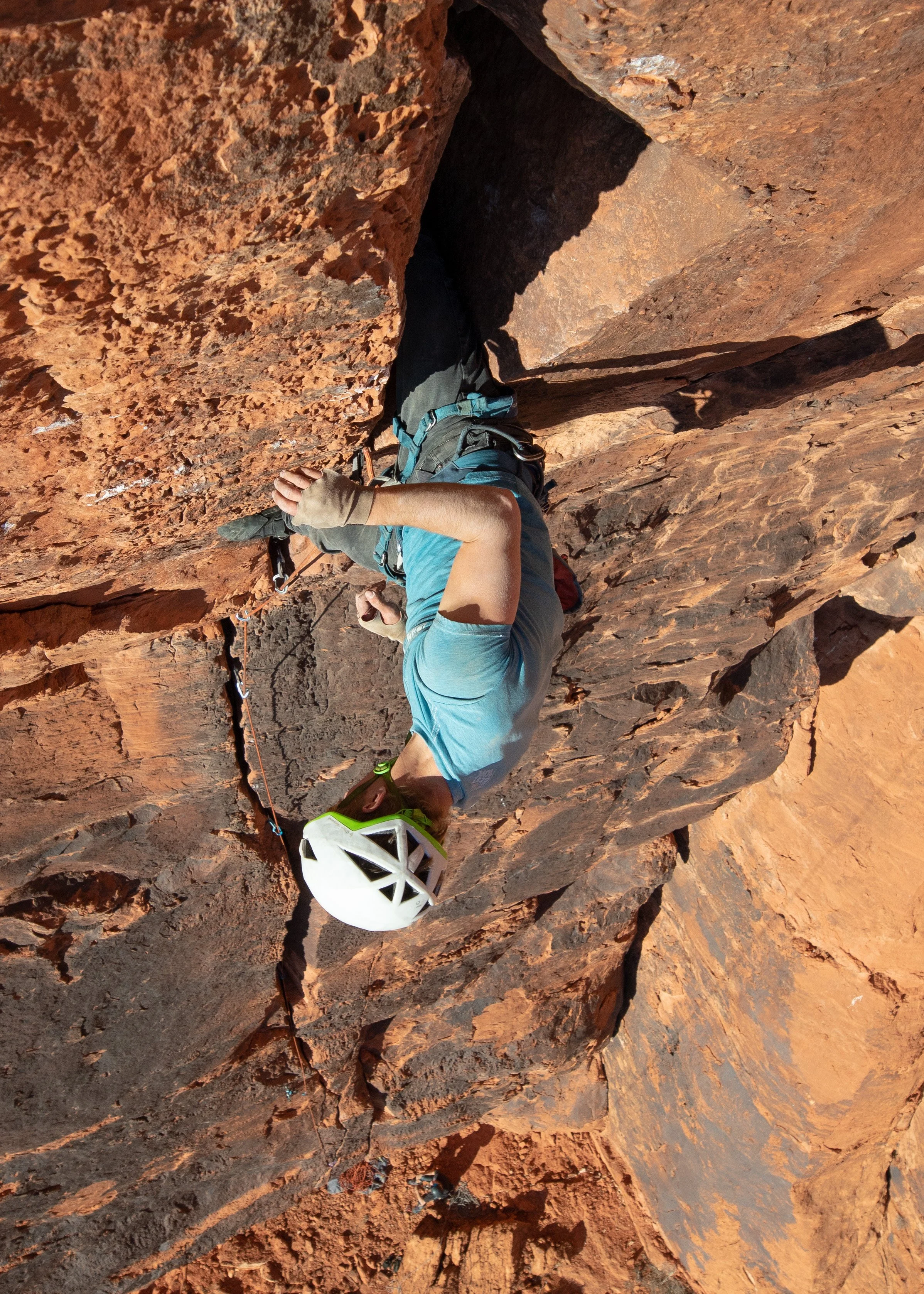 Connor Baty climbing Journey from the Future (aka Abyss) in Snow Canyon Utah. Photo by Fallon Rowe