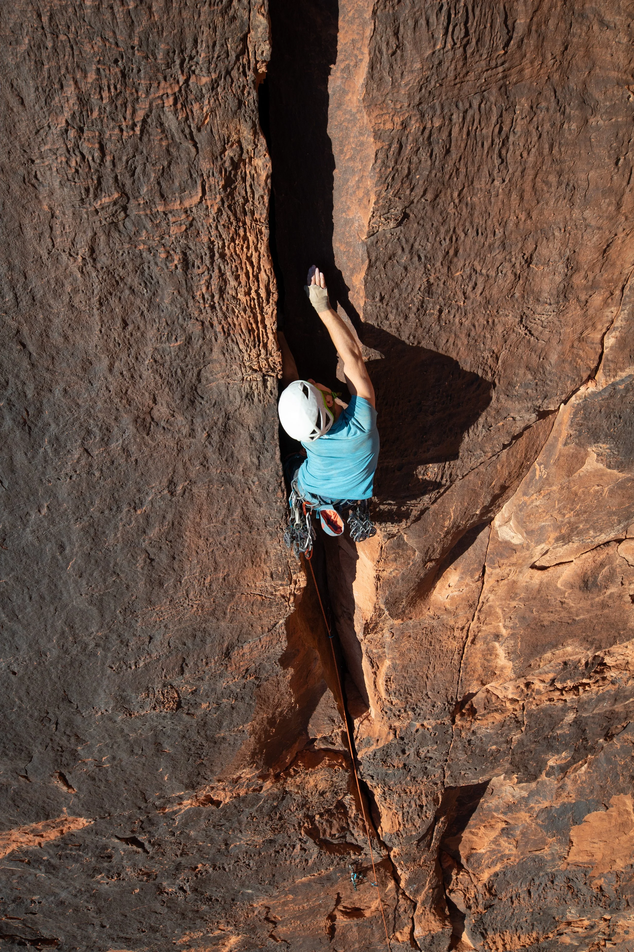 Connor Baty climbing Journey from the Future (aka Abyss) in Snow Canyon Utah. Photo by Fallon Rowe