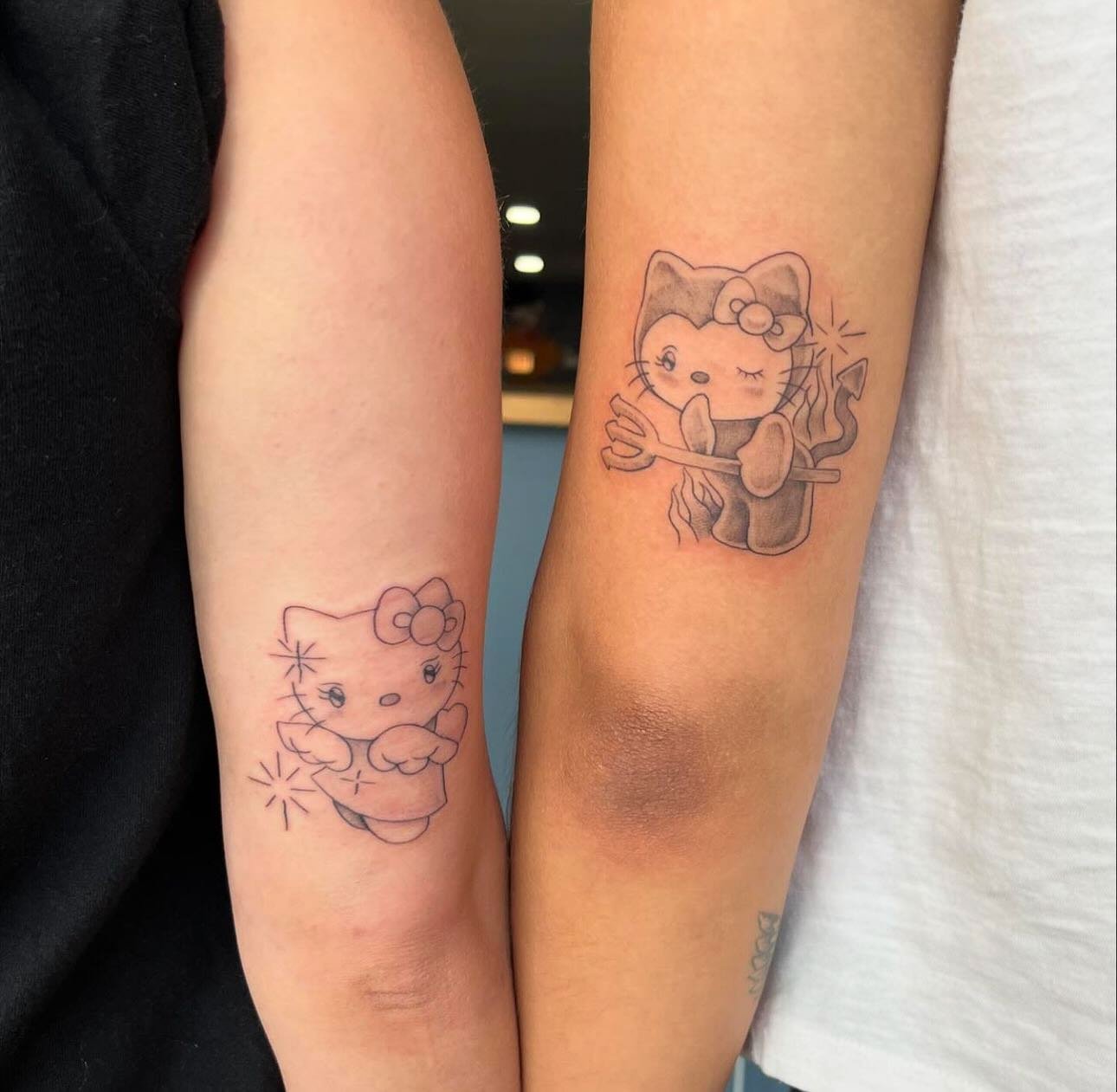 Sibling Hello Kittys by @tattoos_by_michelle