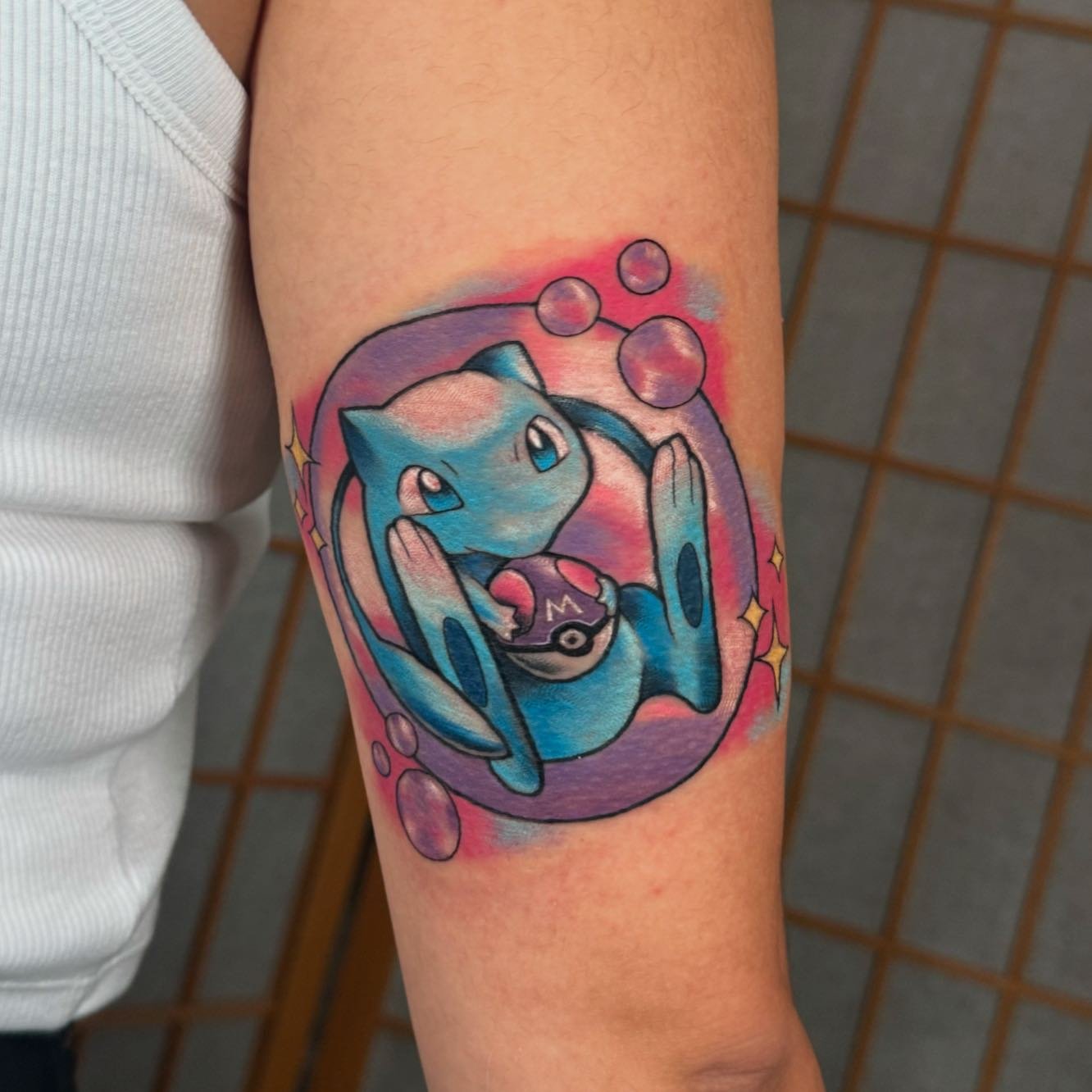 Mew by @fishscvle_tattoos