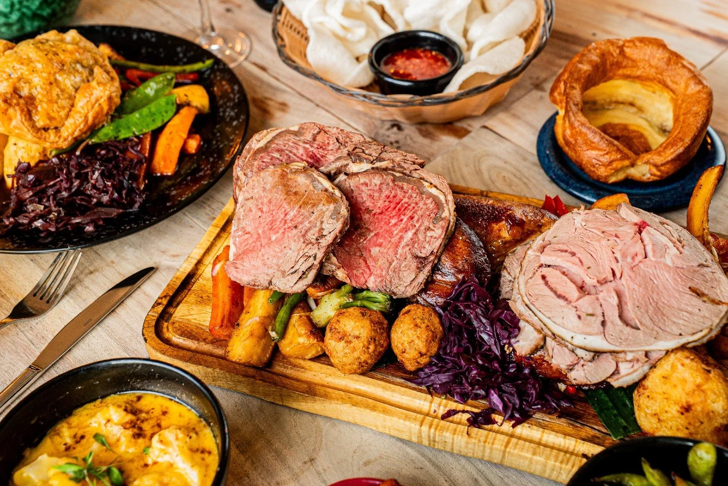 Three meats. One legendary platter 🍖

Can't choose? Don't.

BAHA's Extraordinary Sharing Sunday Roast gives you teriyaki chicken, spiced lamb shoulder, AND 28-day aged beef on one epic platter.

Add kimchi stuffing, maple-glazed veg, and salt &amp; 