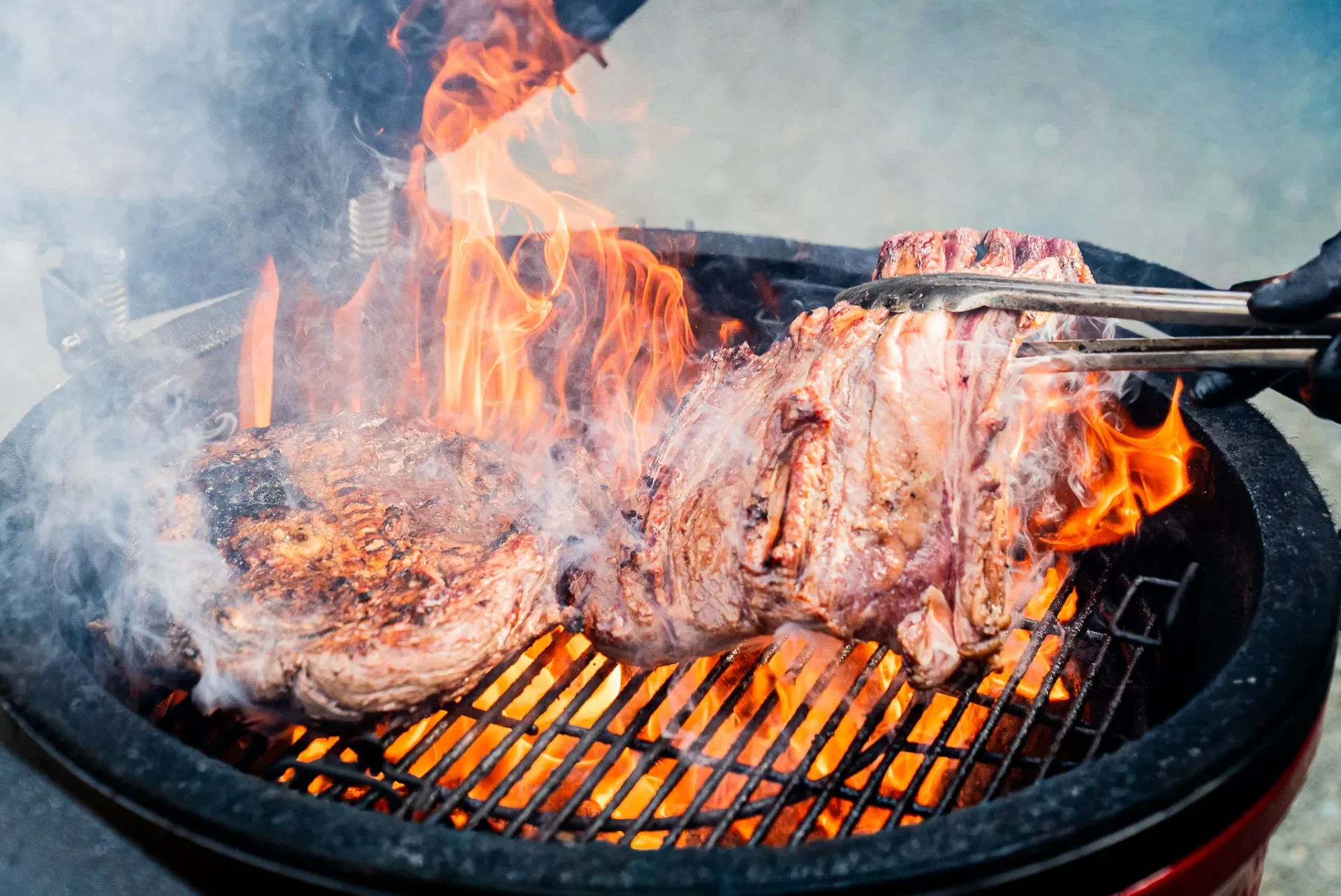 DSC00838-windermere restaurants bbq grill meat on flame.webp