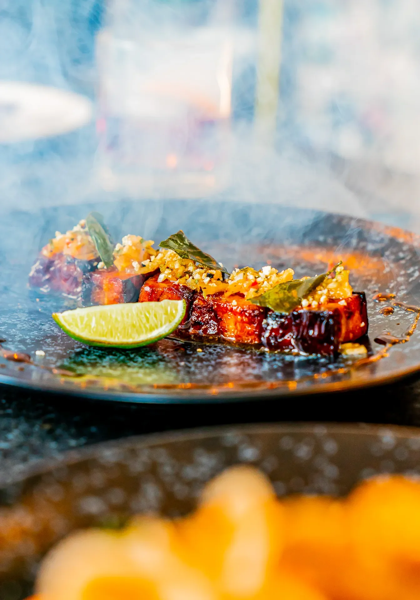 DSC01526-BAHA-windermere restaurant starter on black plate.webp