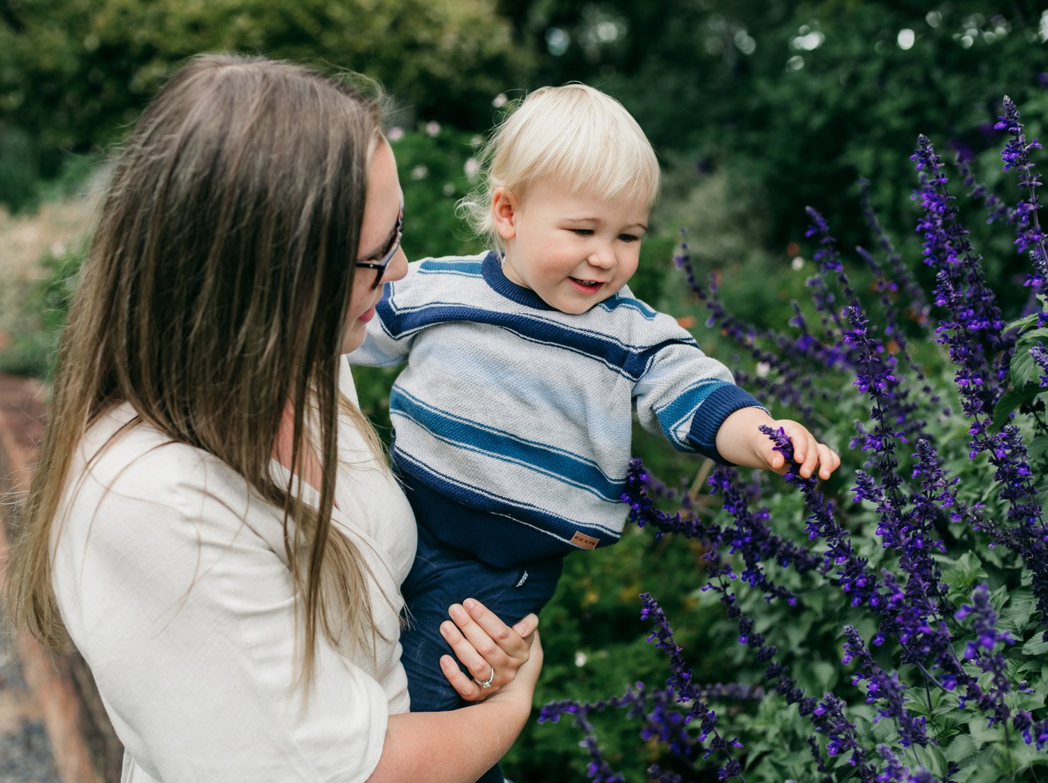 Mum and toddler touching flower.jpg