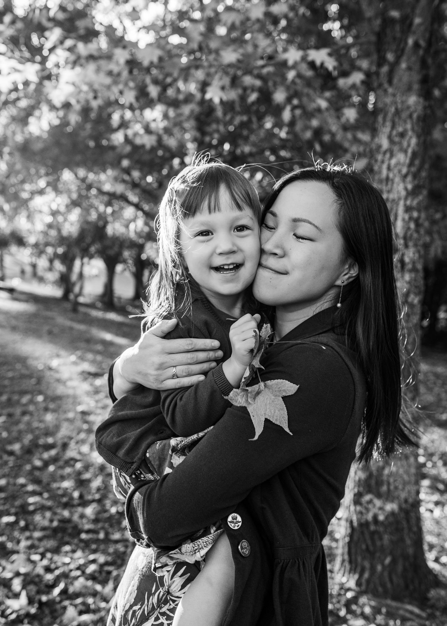 Mum and toddler daughter hugging.jpg