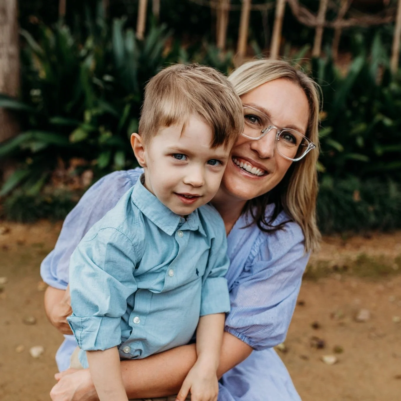 Toddler and mum smiling at camera.jpg