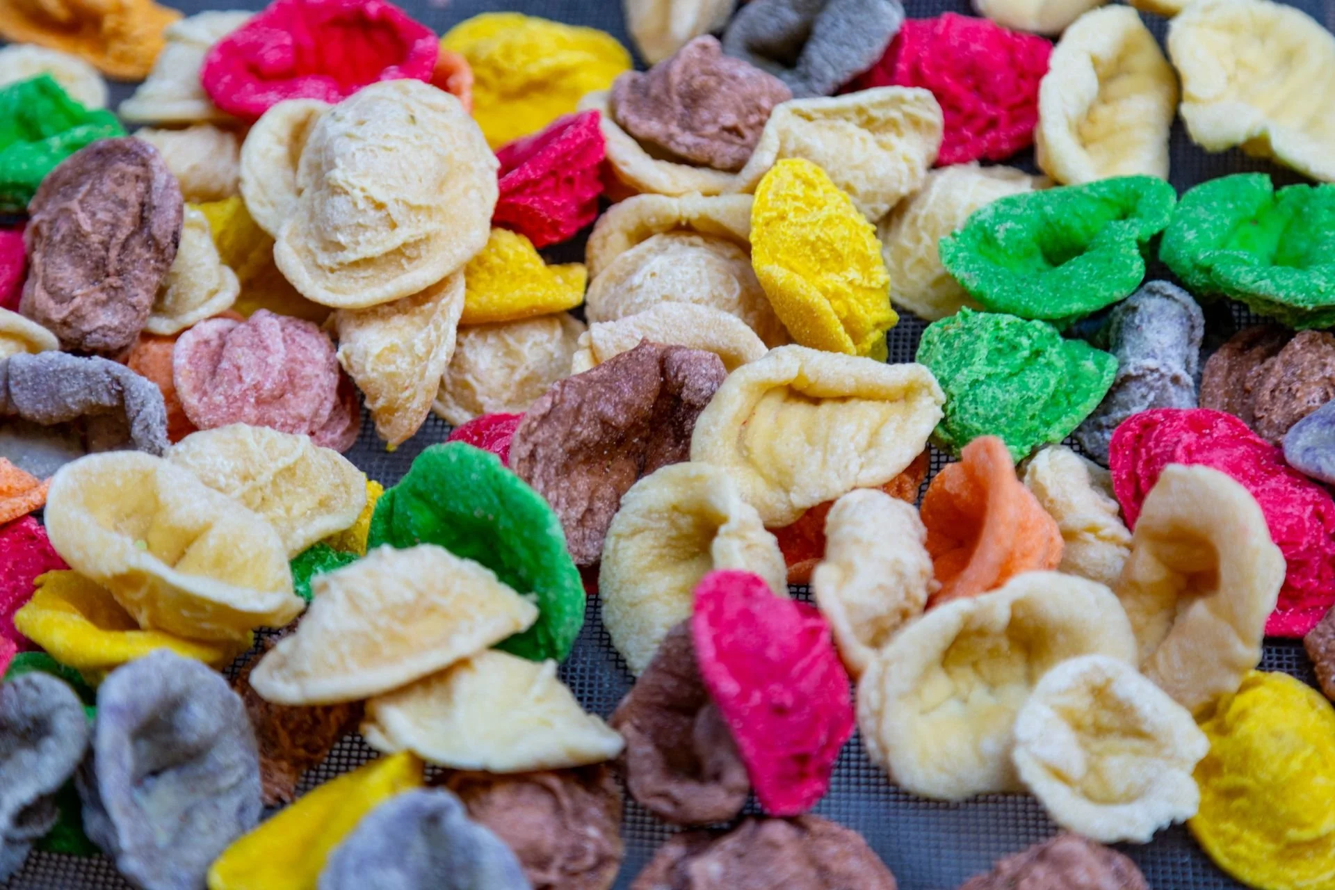 Colourful handmade orecchiette pasta, a Puglia speciality