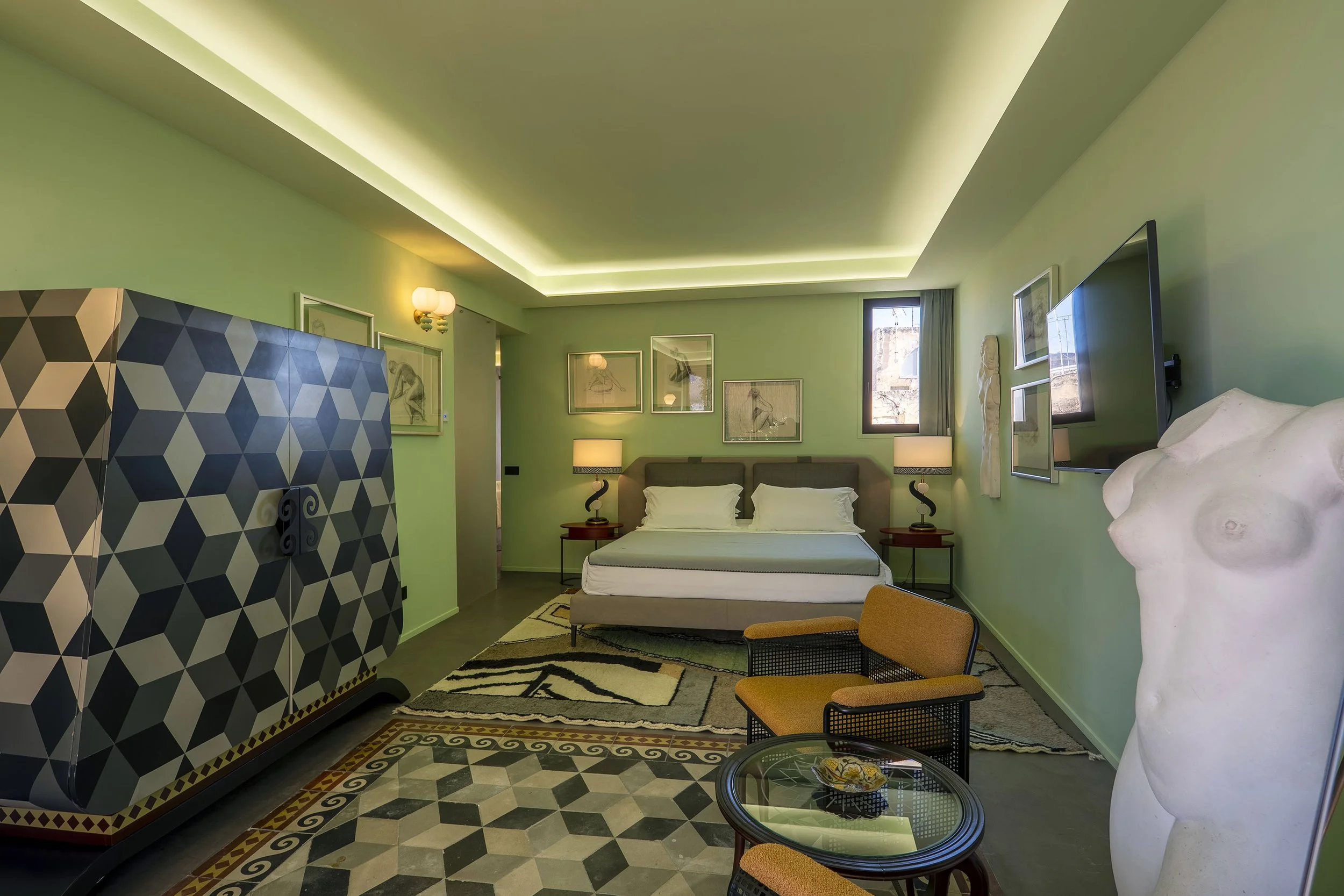 Art-filled suite with classical sculpture at La Fiermontina, Lecce