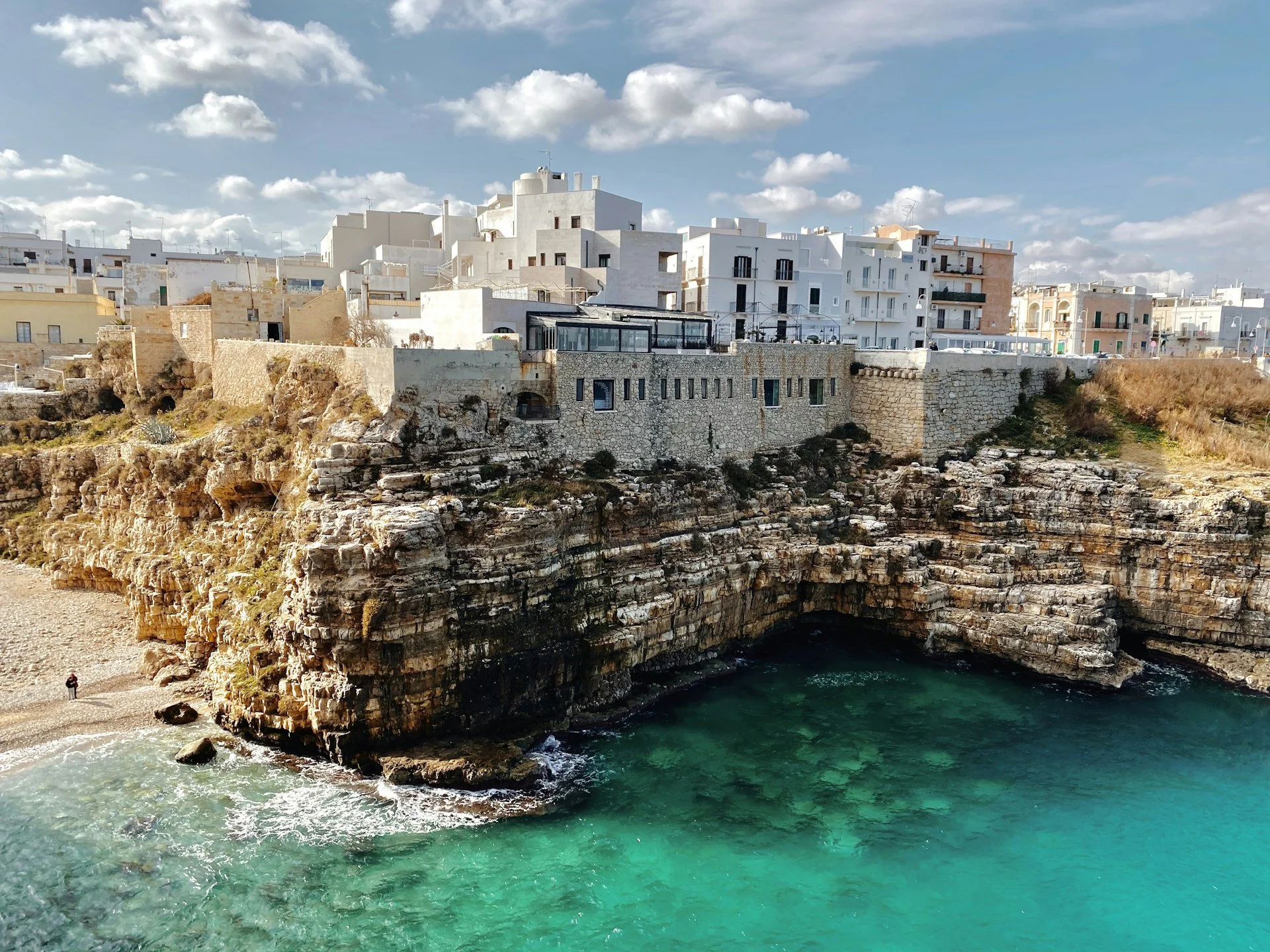 Whitewashed houses of Polignano a Mare on cliffs above the Adriatic