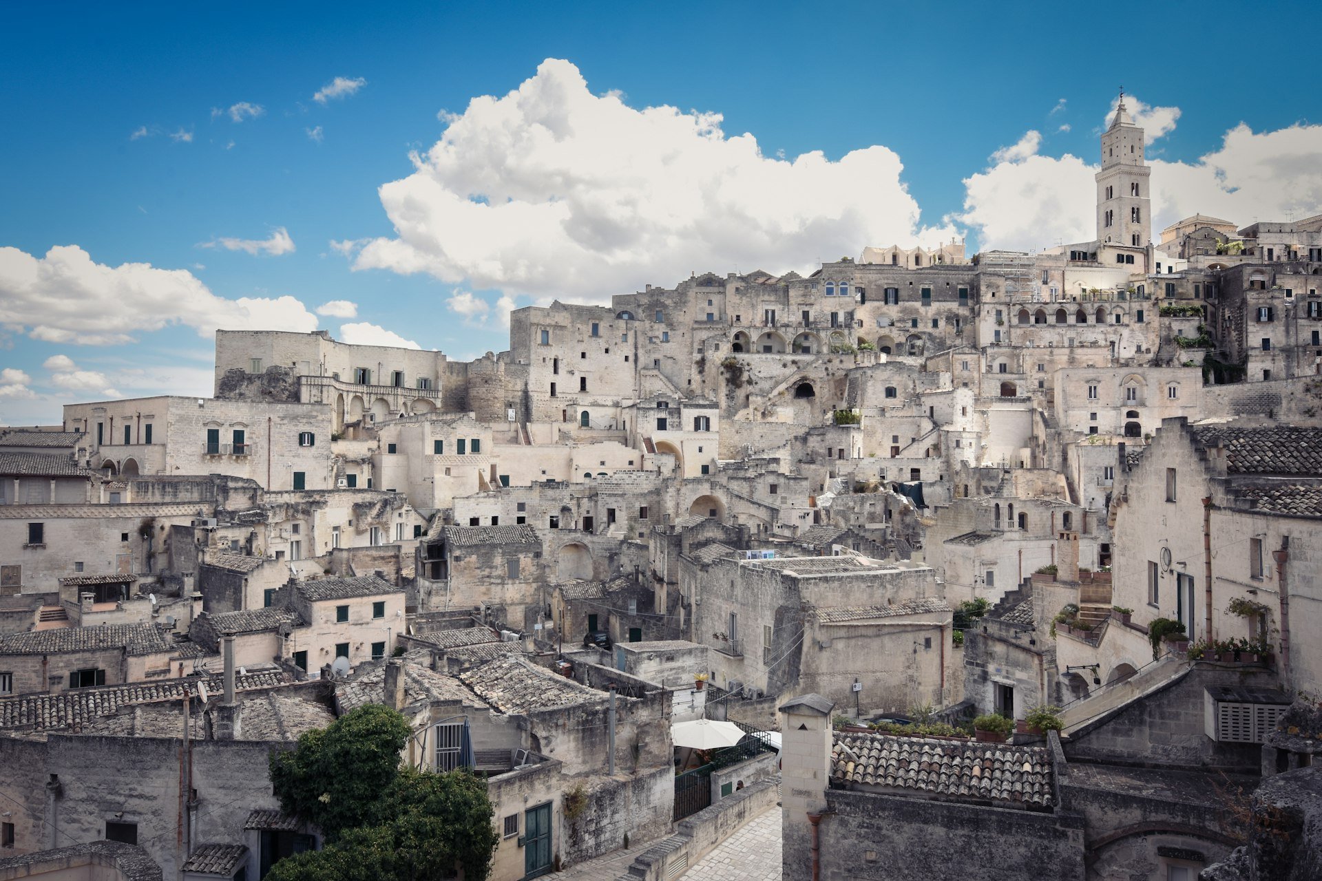Stone houses and churches of Matera's old town stacked up the hillside